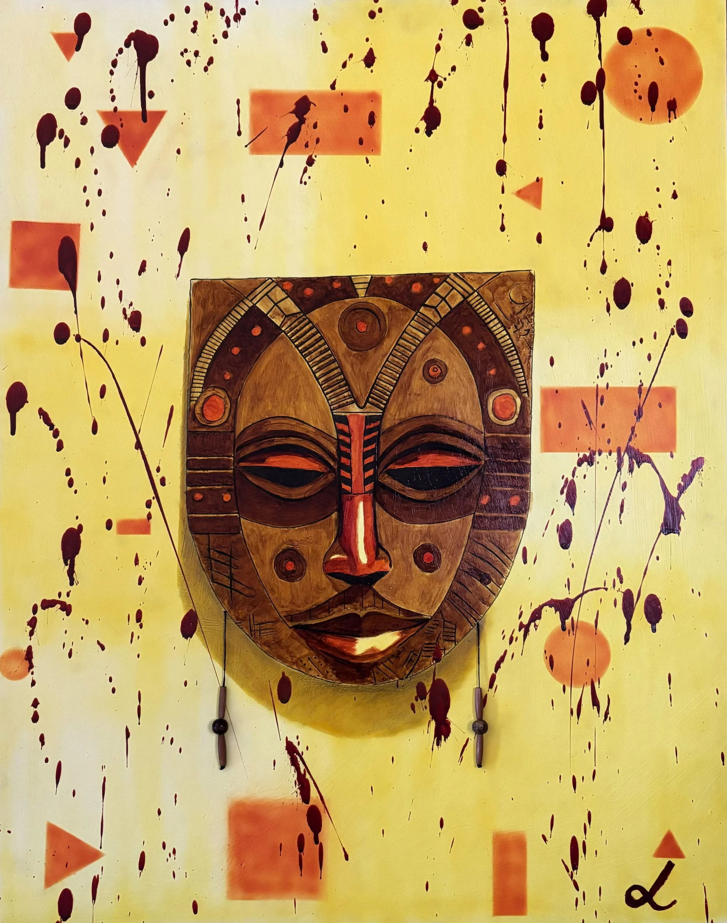 "Peaceful Unrest", acrylic and wooden beads on chipboard, 2025, 28"x22". A brown wooden mask with accents of red on its stylized face, including on the eyelids and nose. There is a yellow background with scattered geometric shapes in orange and dark 