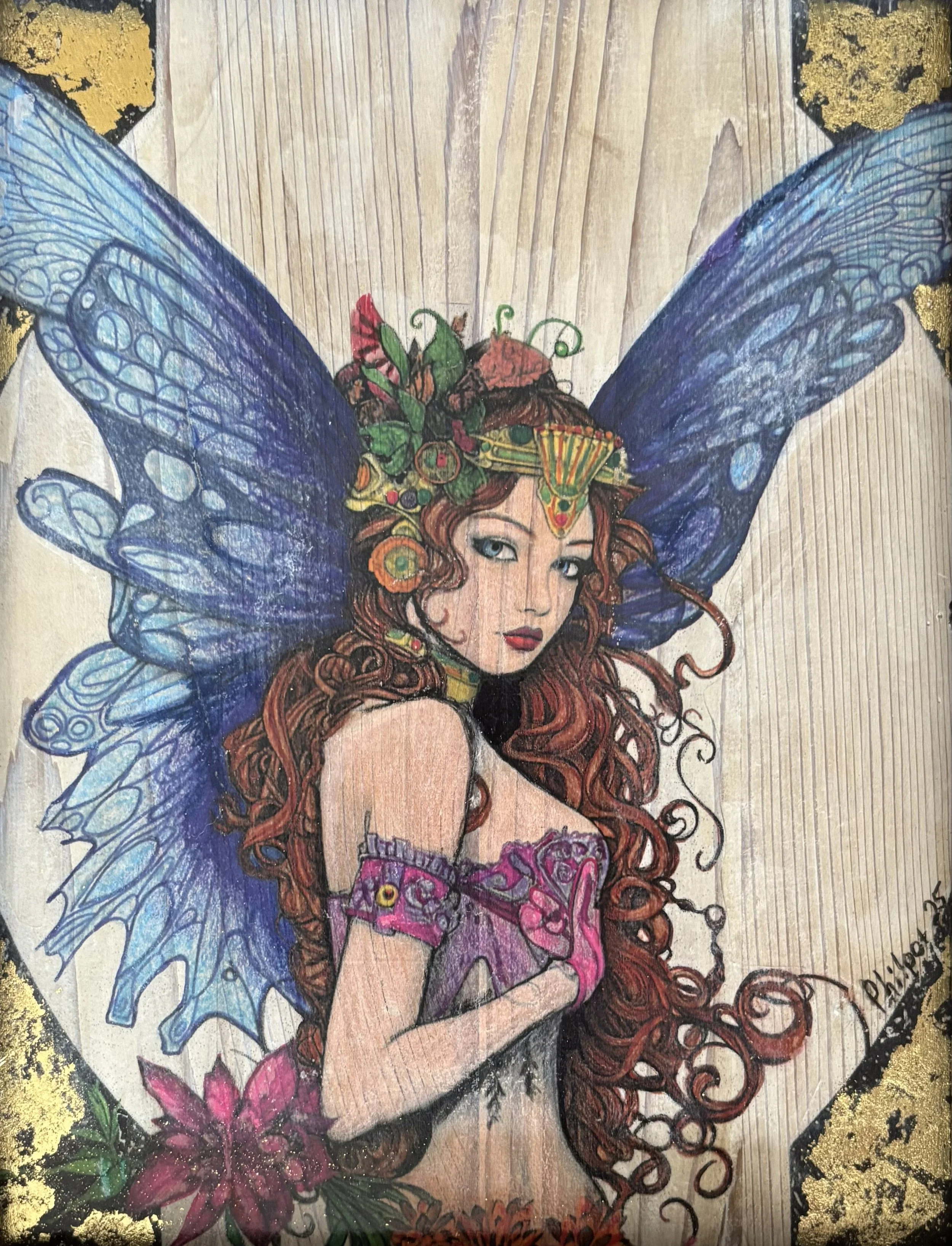 "Fairy Seduction" / 2026 / Color pencil, marker, acrylic, and gold leafing on cedar plank / 12" x 9" / FOR SALE $50. A white fairy with blue butterfly wings and a flower crown in her brown hair, looking at the viewer. The background is wood with obvi