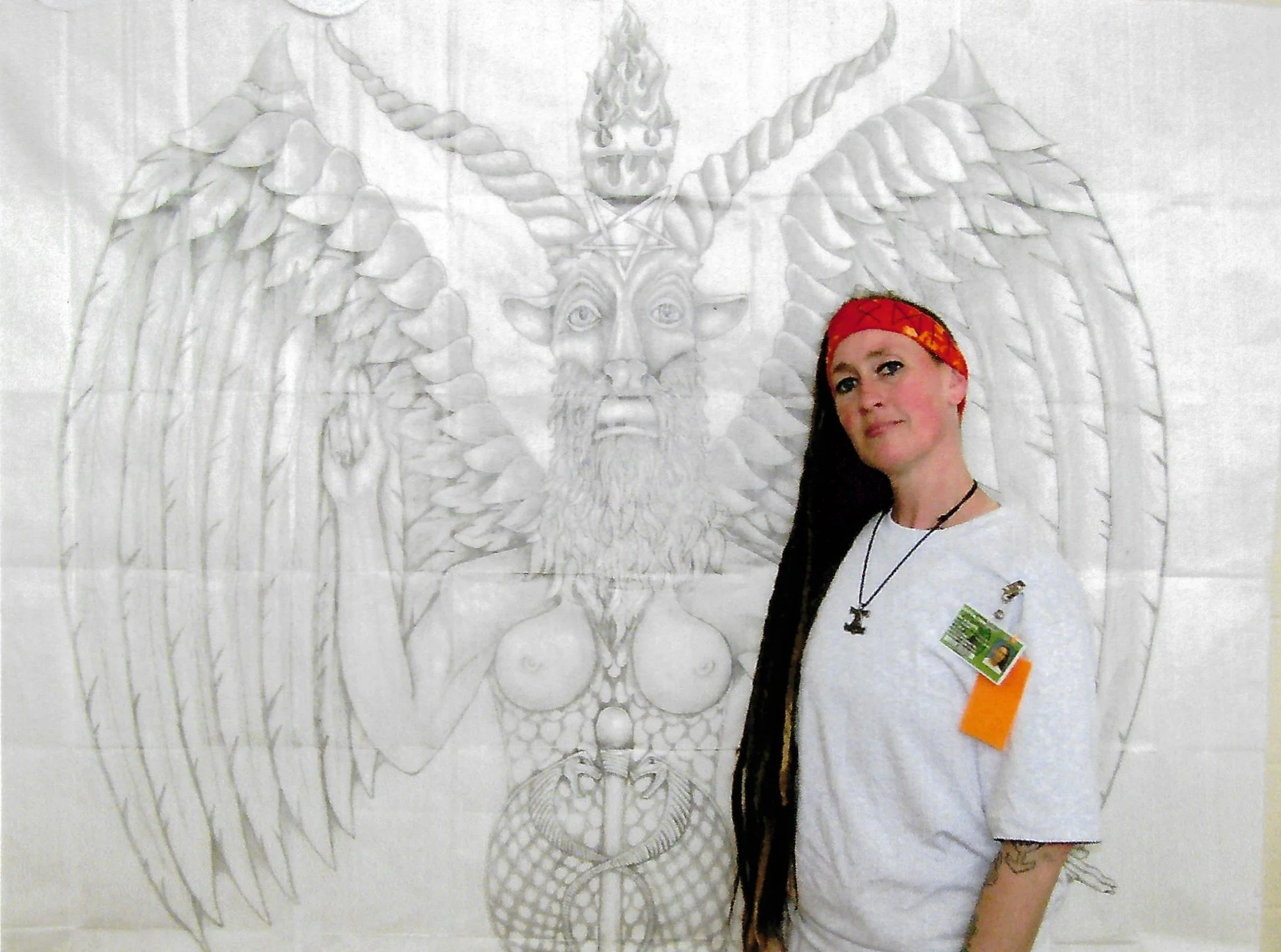 "Baphomet", photo of graphite on paper, 2025. Six foot tall image of the Baphomet. Known from his use in the Church of Satan. He is a horned god that has the arms and penis of man, breasts of a woman, face and feet of a goat, and large angelic wings.