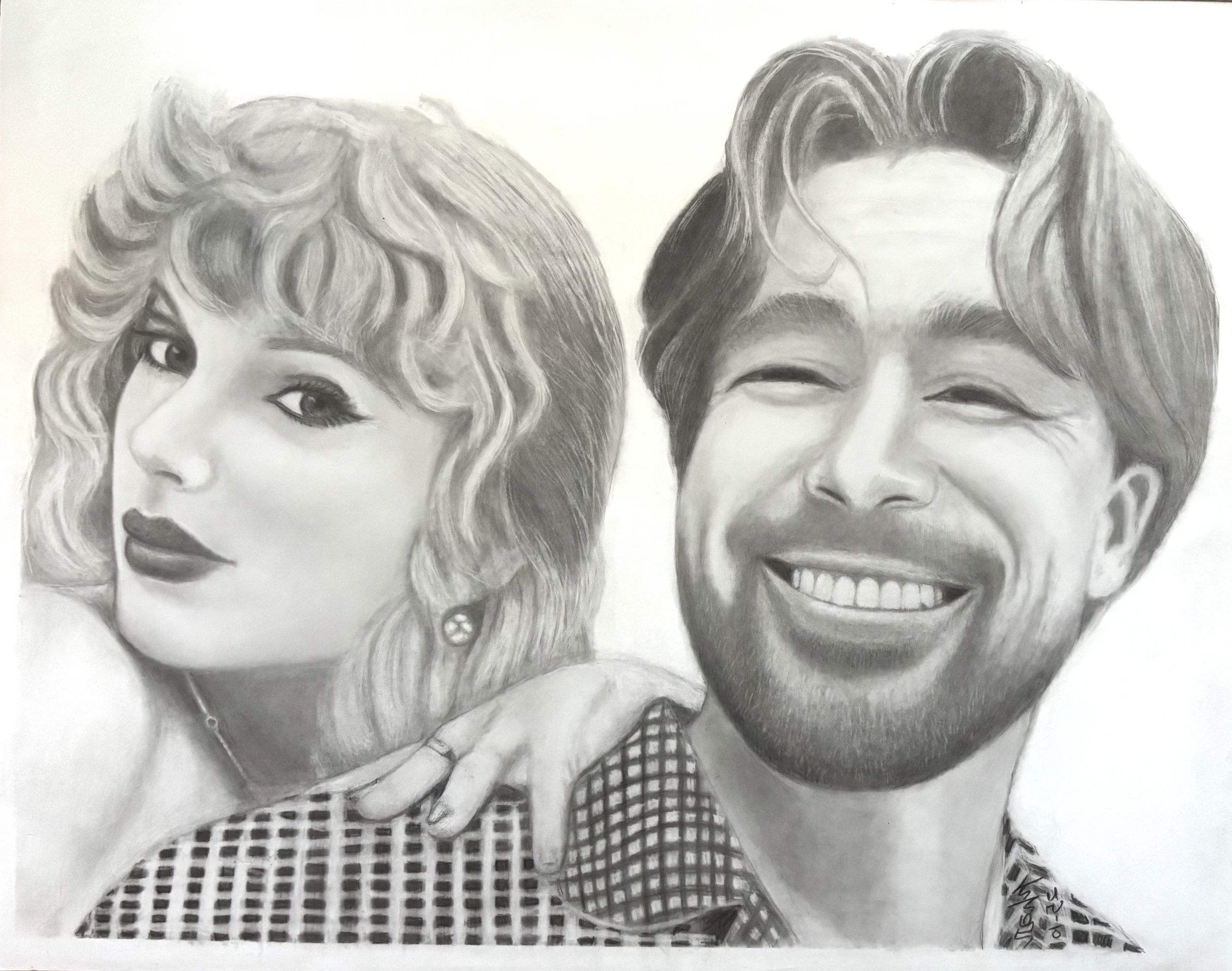 "Taylor & Travis #2" / 2026 / Graphite on paper / 22" x 28". Taylor Swift and Travis Kelce. Taylor has bangs and is partially in profile. Travis is smiling and in portrait