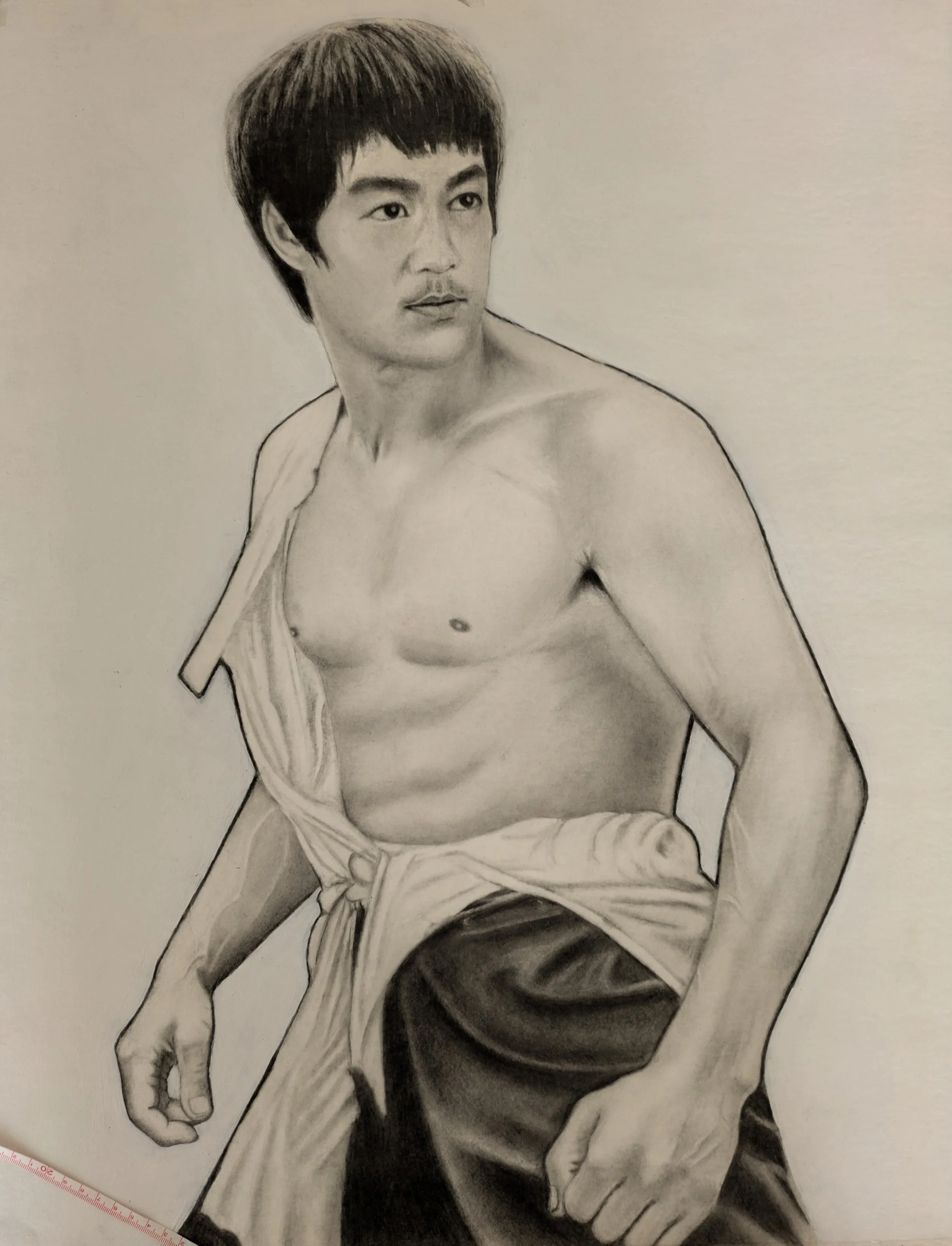 Black and white portrait of Bruce Lee