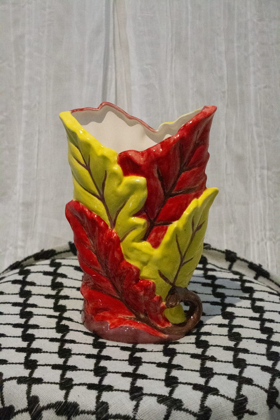 "Vase 11", a small ceramic vase of leaves painted in yellow and red