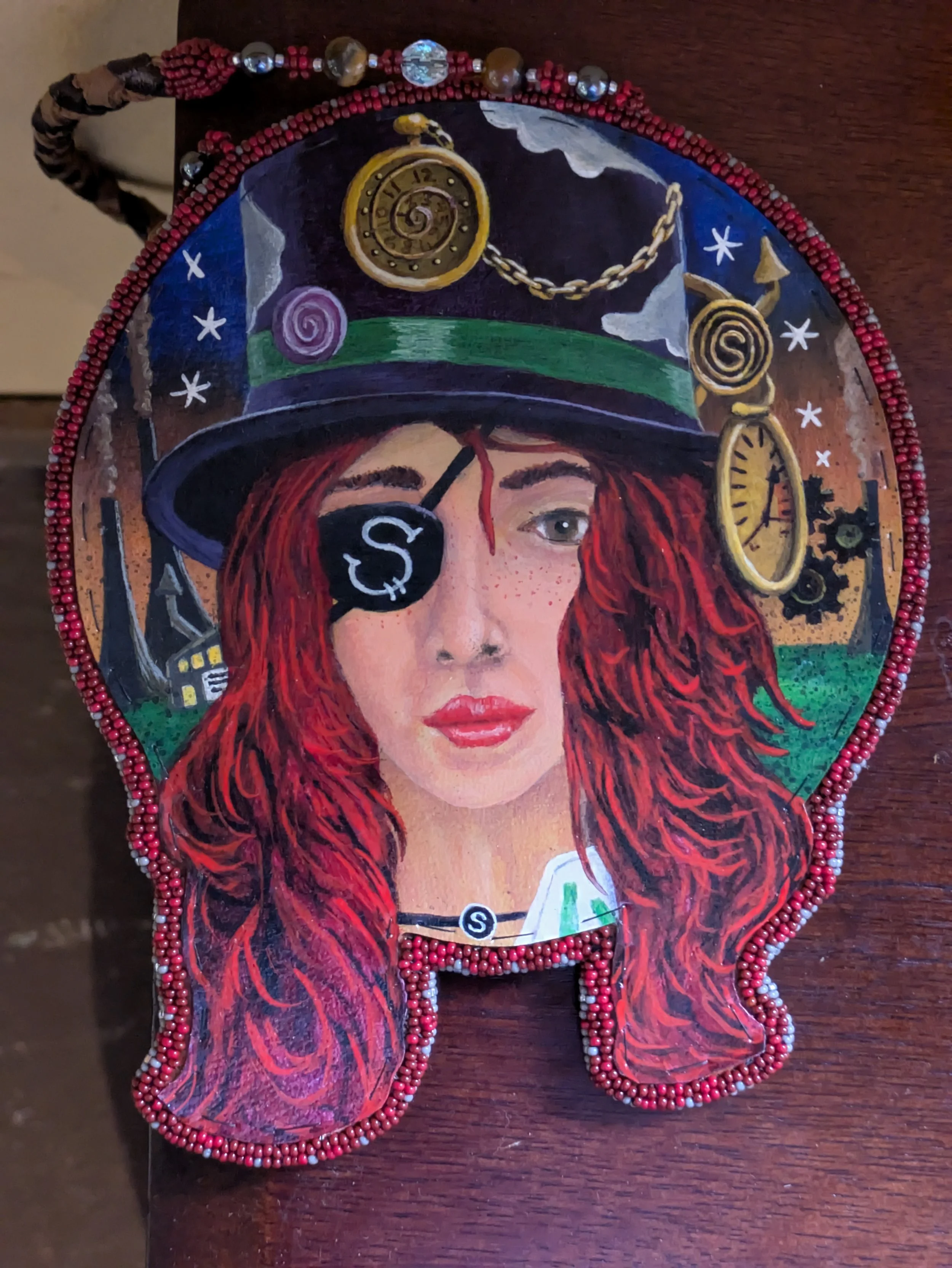 Portrait of a white pirate woman with long red hair, a top hat with clocks on it, and an eye patch