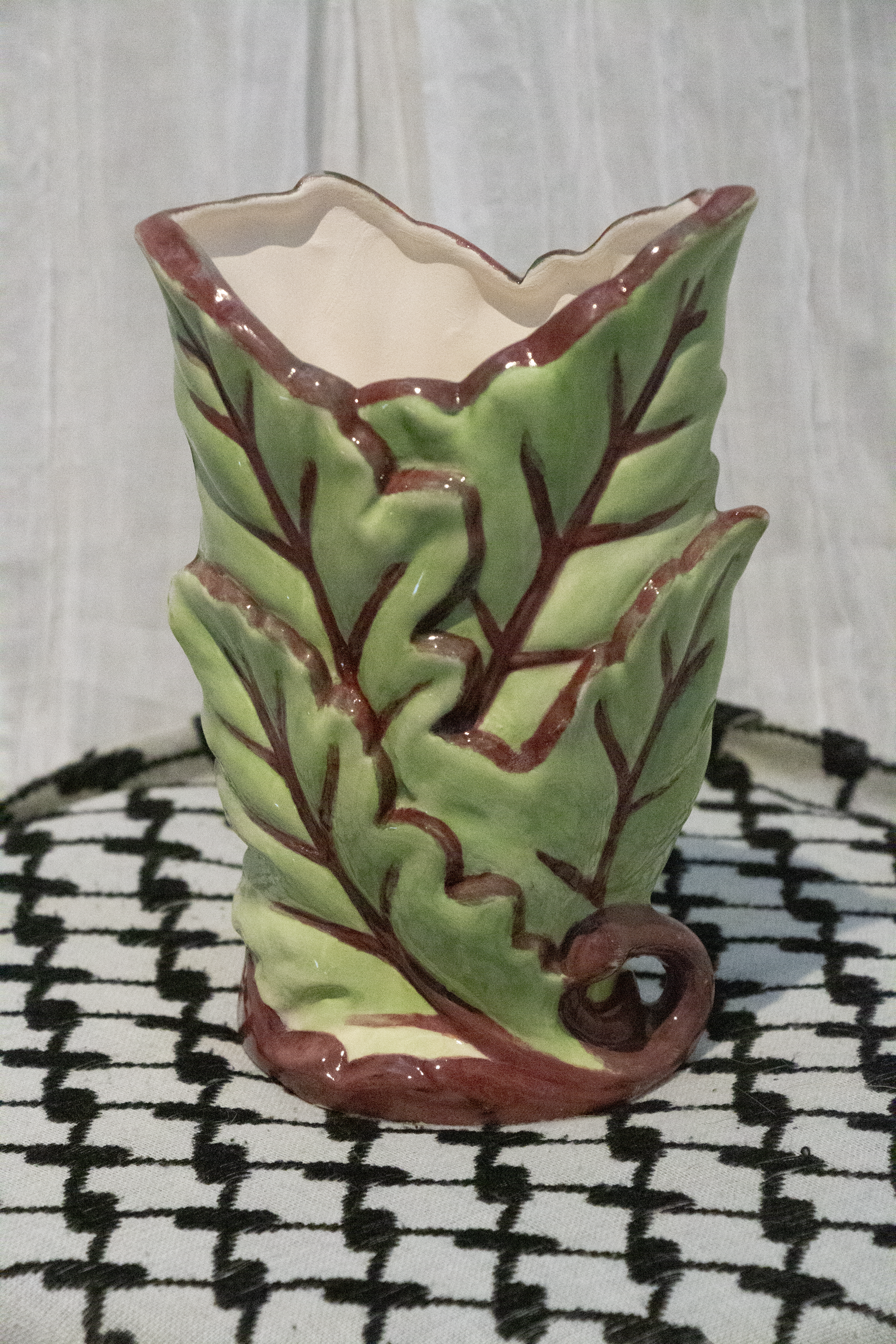 "Vase 7", a small ceramic vase of light green leaves