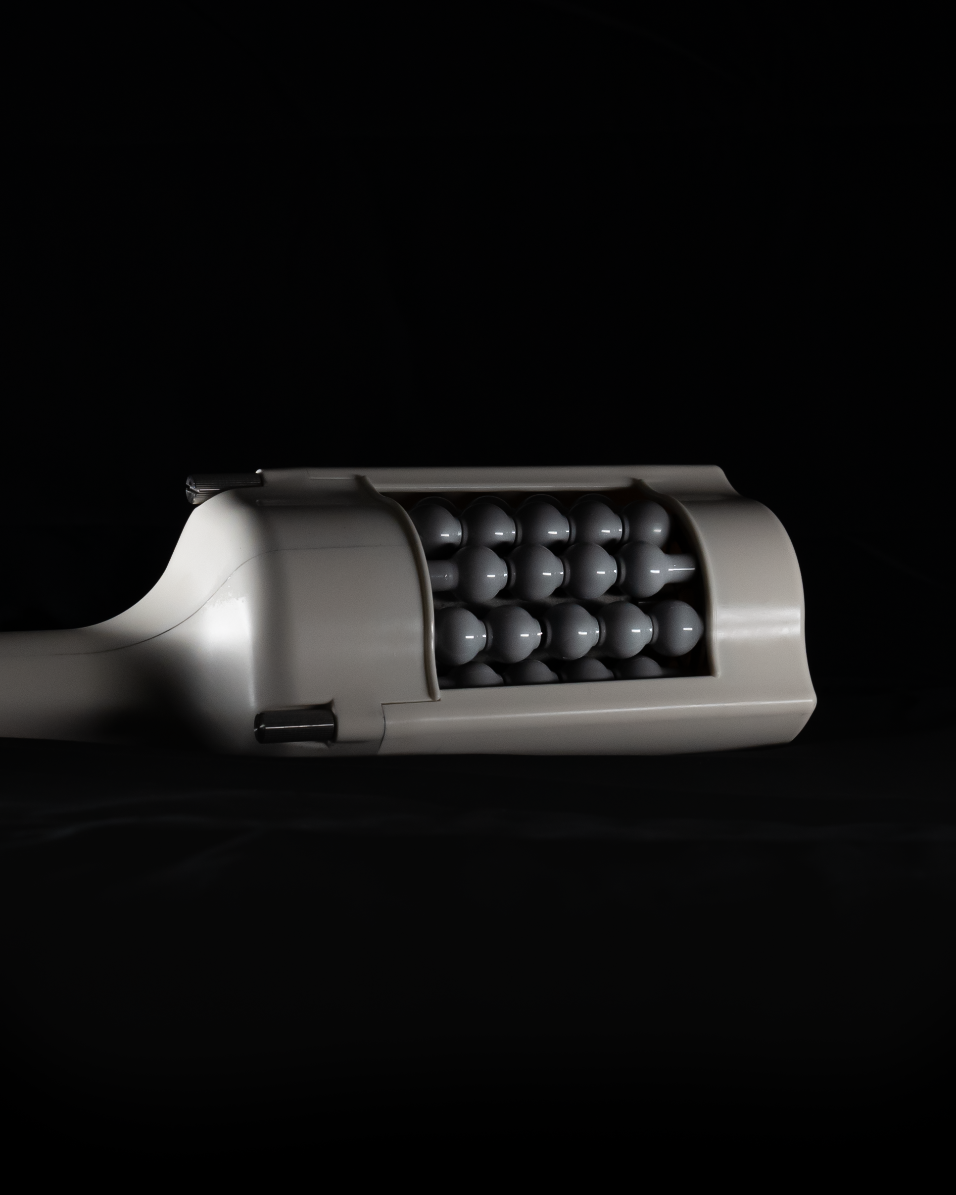 T-Shape 2 handpiece attachment with a grid of rounded massage roller balls