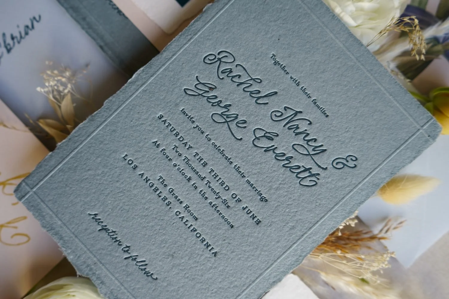 Letterpress wedding invitations with blind emboss border
