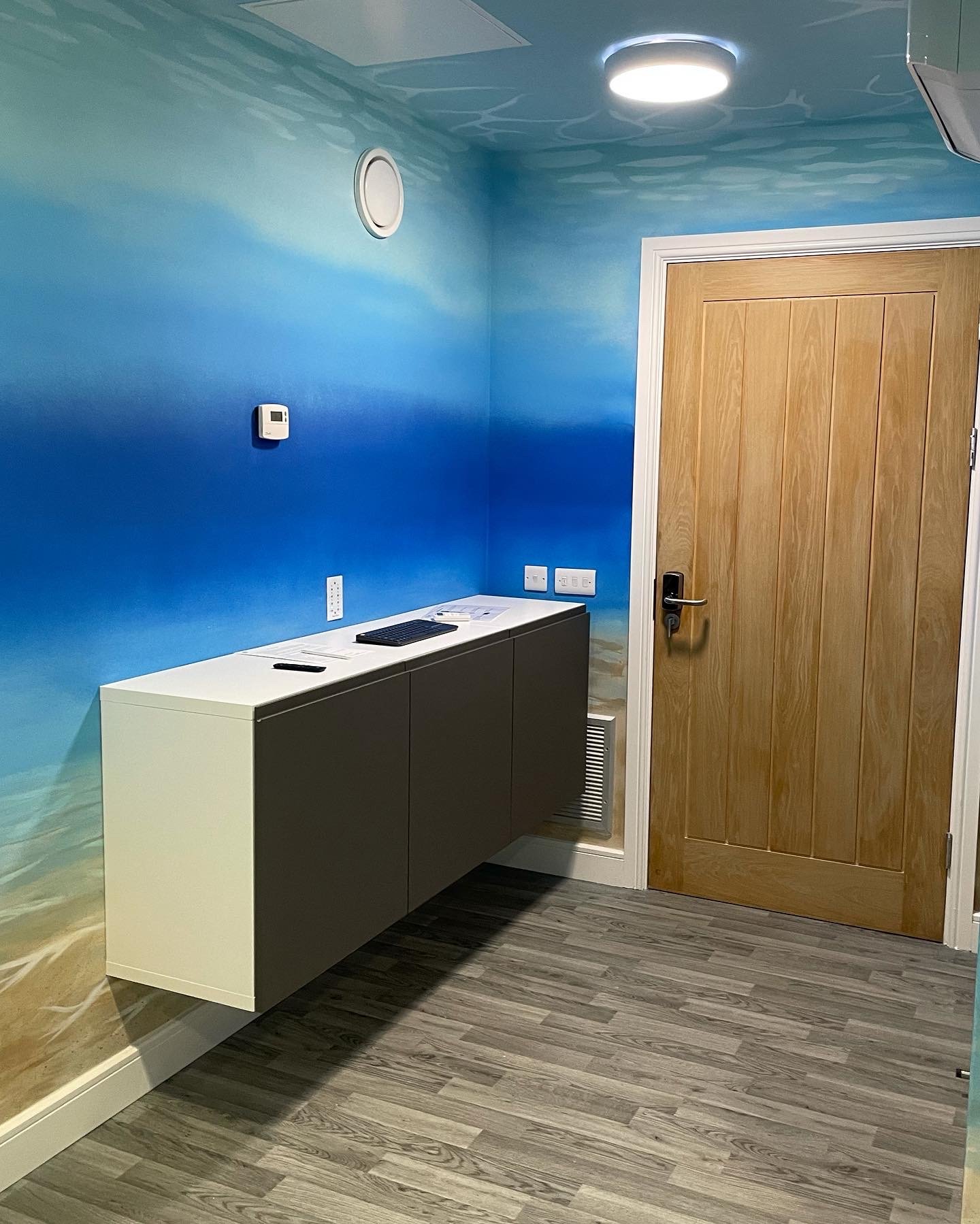 Business wall mural under water