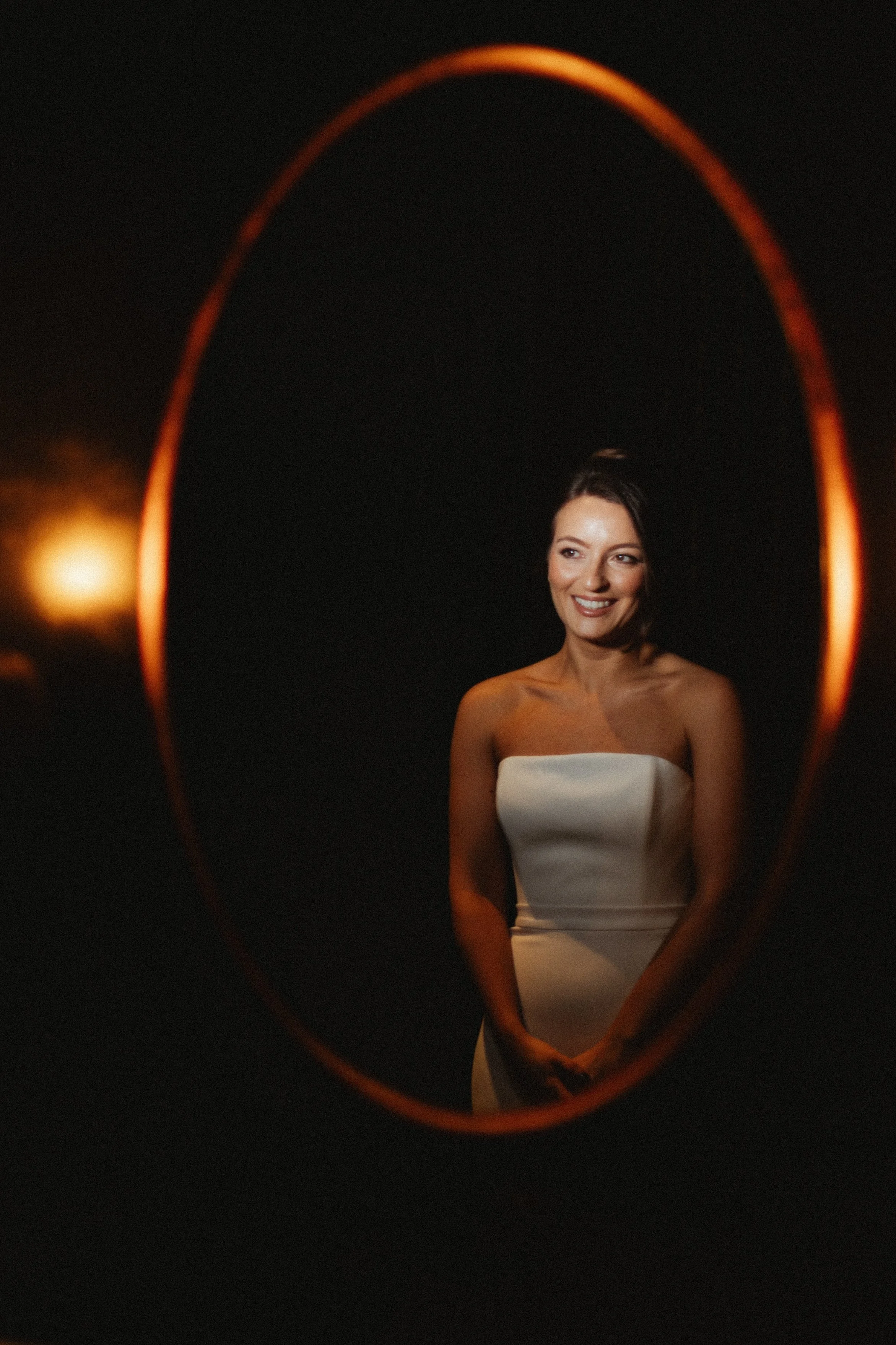 Bride getting ready in mirror
