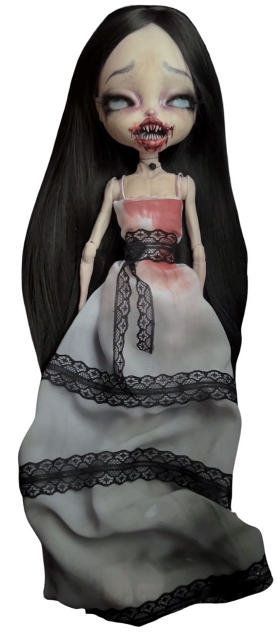 A creepy doll with long dark hair, large head, and distorted face with hollow eyes, sharp teeth, and stitched mouth, wearing a tattered dress with black lace.