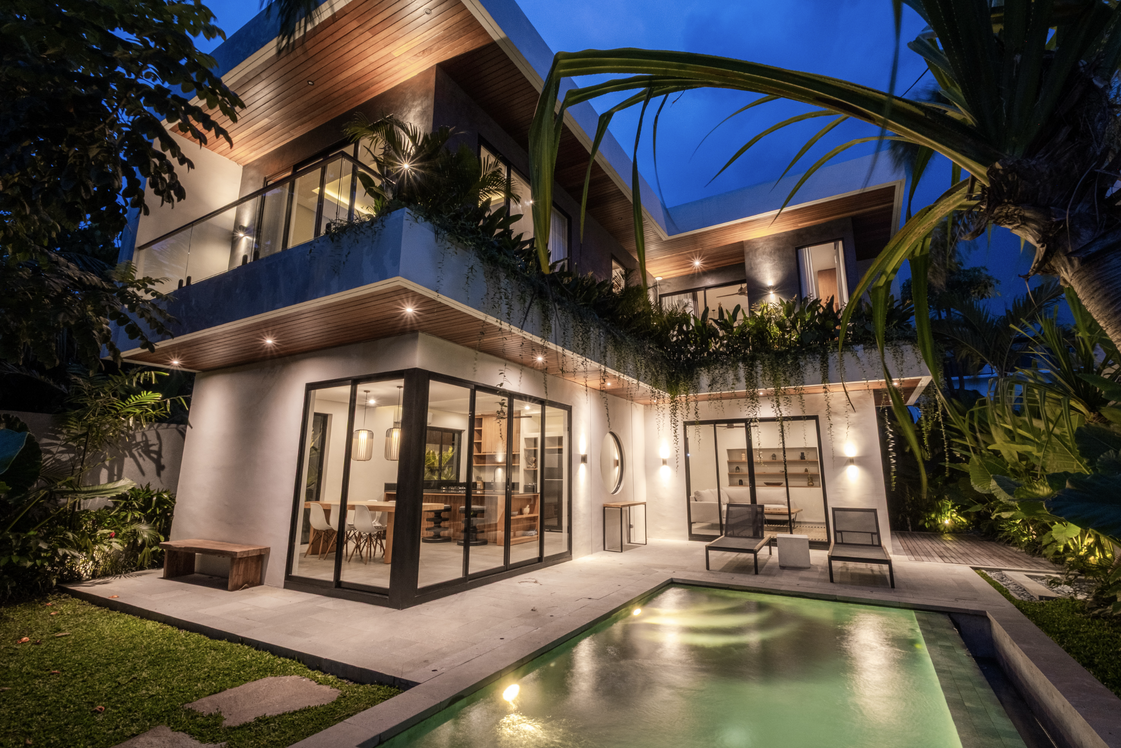 TSURI Villas exterior at night in Kedungu Bali