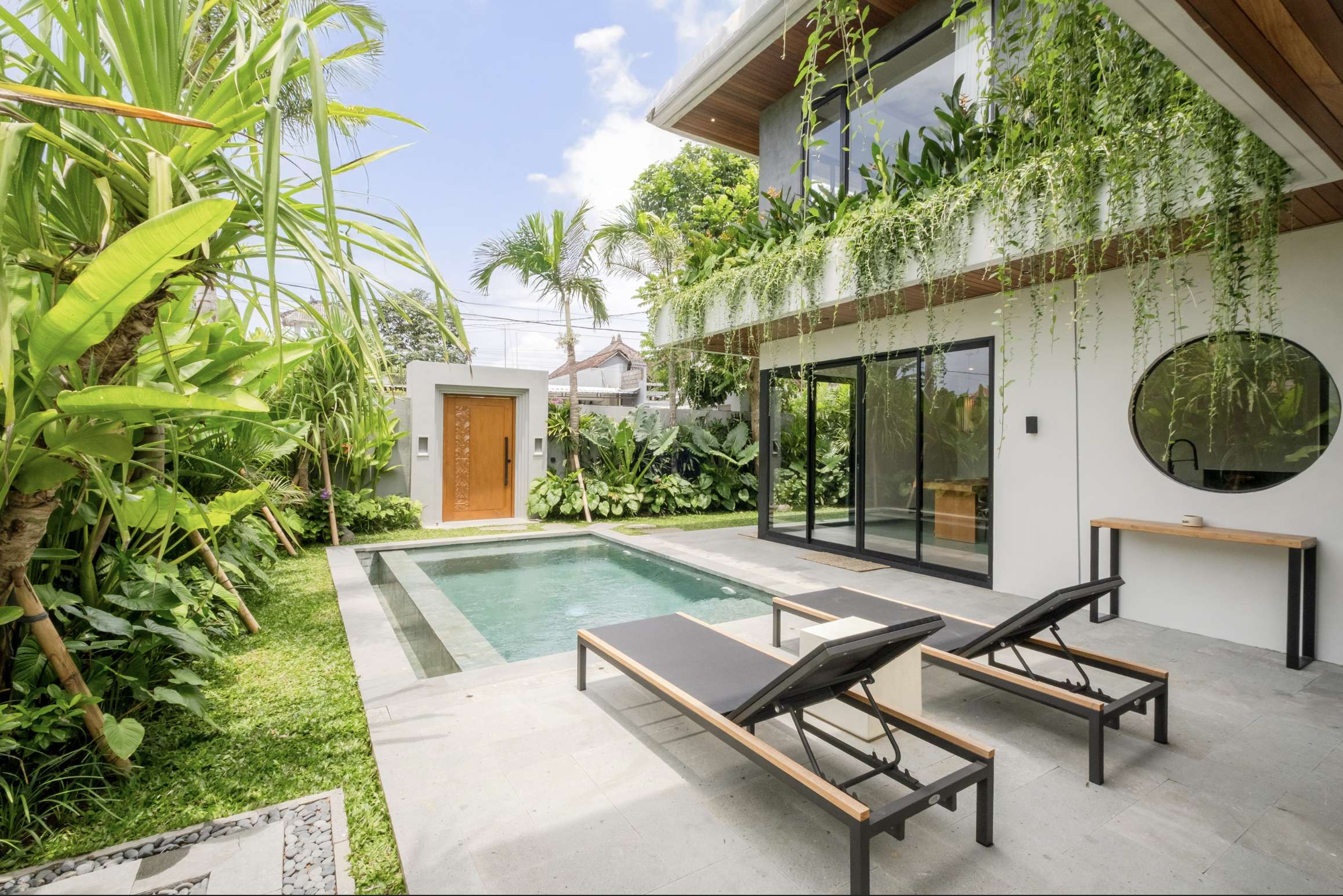 TSURI Villas pool and tropical garden in Kedungu Bali