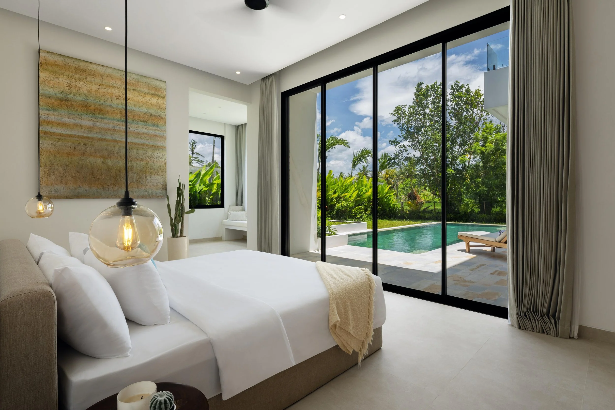 KIWI Villas bedroom overlooking the private pool