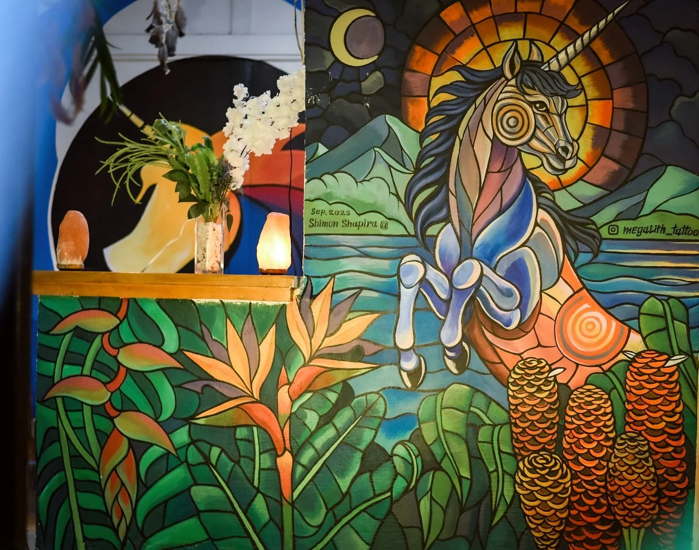 🎨✨ At Unicorn Reborn, we love creating spaces that inspire &mdash; places where comfort, creativity, and connection come together. Our friend and artist Shimon recently brought new life to our walls with a vibrant mural featuring a majestic unicorn,