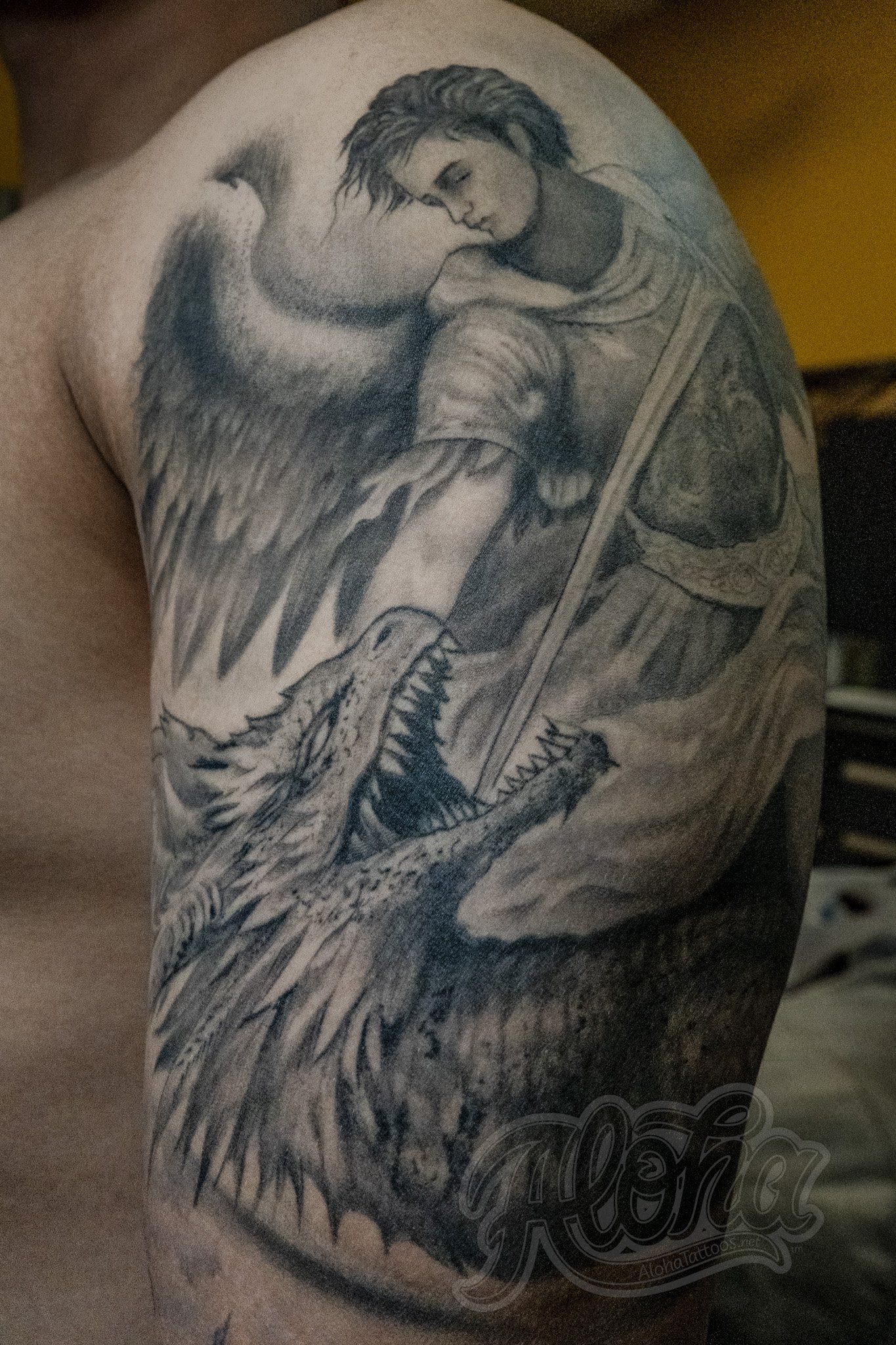 Black and grey illustrative tattoo