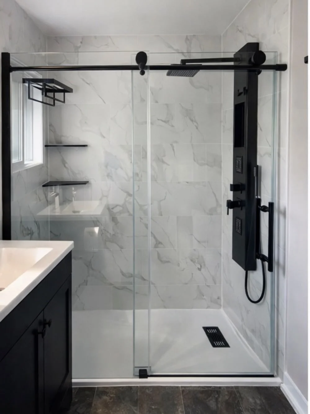 Clean lines, bold finishes, and a shower that speaks for itself 🔥

This bathroom went from basic to a sleek, modern space with a full glass enclosure, matte black fixtures, and a layout that maximizes every inch. Simple, functional, and built to las