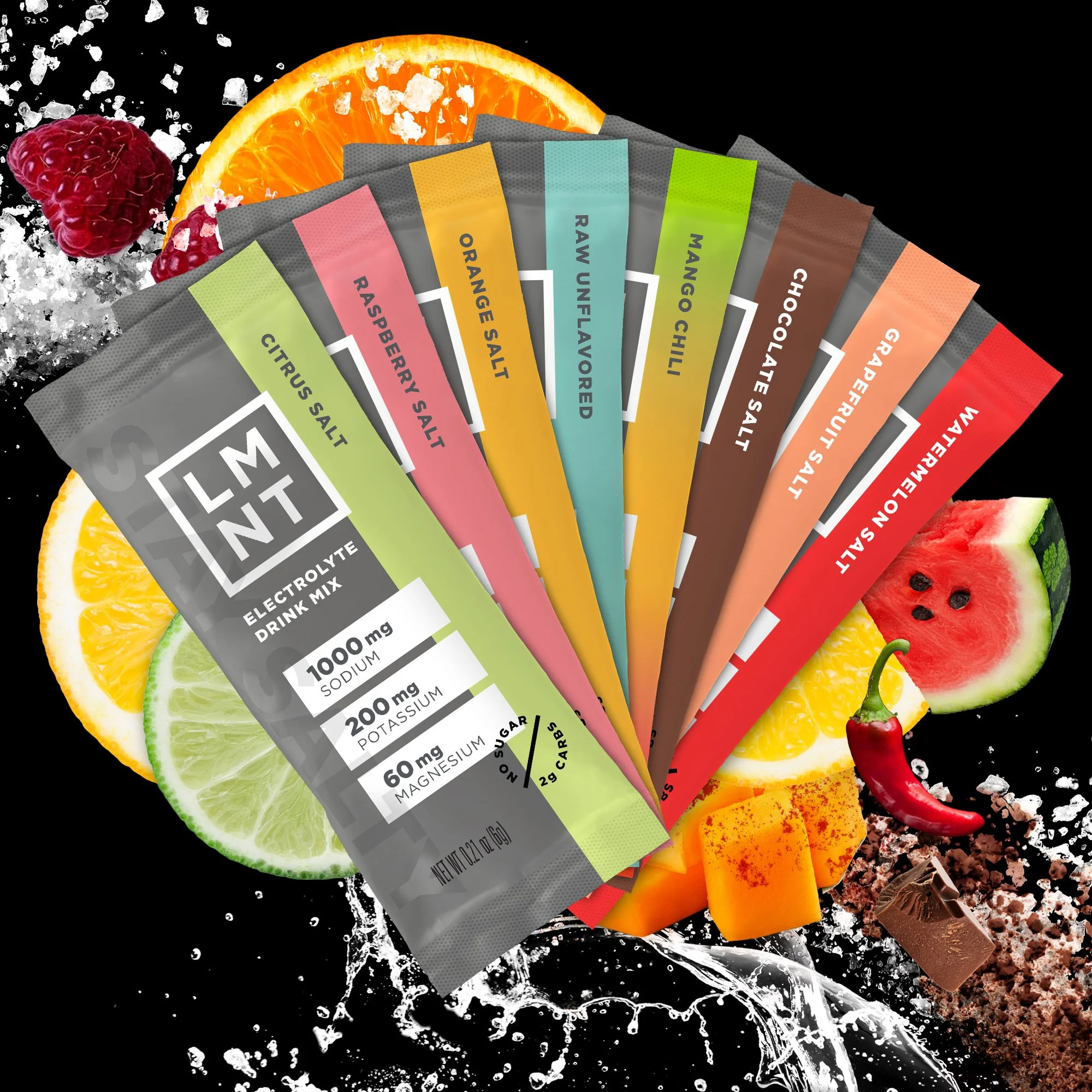 Colorful handfuls of flavored powder drink packets arranged on black background with slices of orange, lemon, lime, watermelon, and chocolate pieces.
