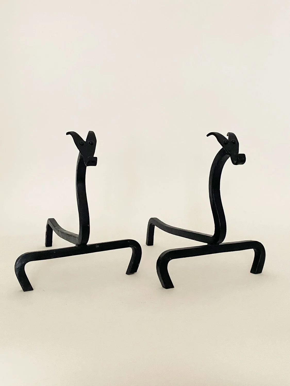 Paire de chenets zoomorphes