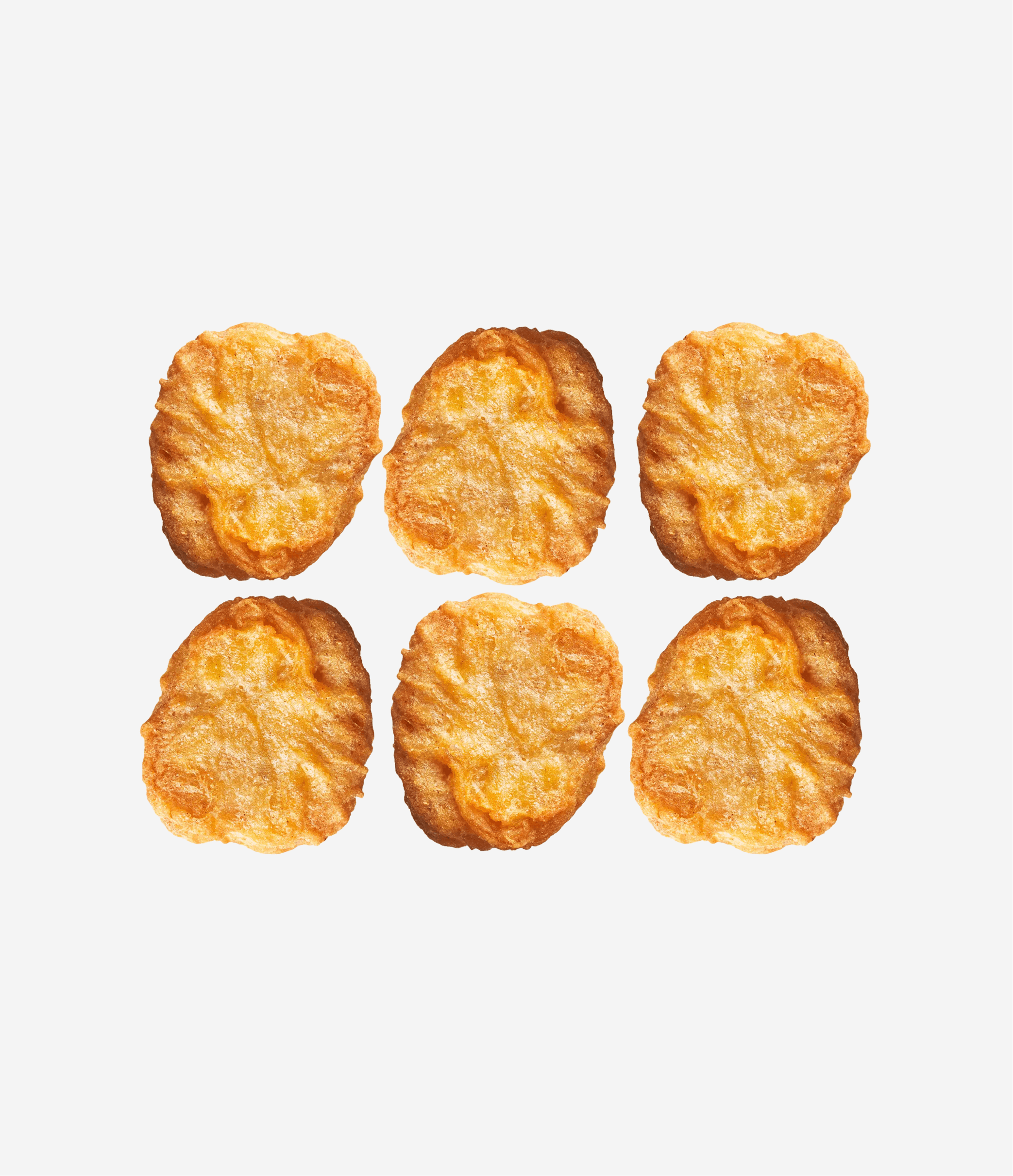 Six fried potato wedges arranged in a 2x3 grid on a plain white background.