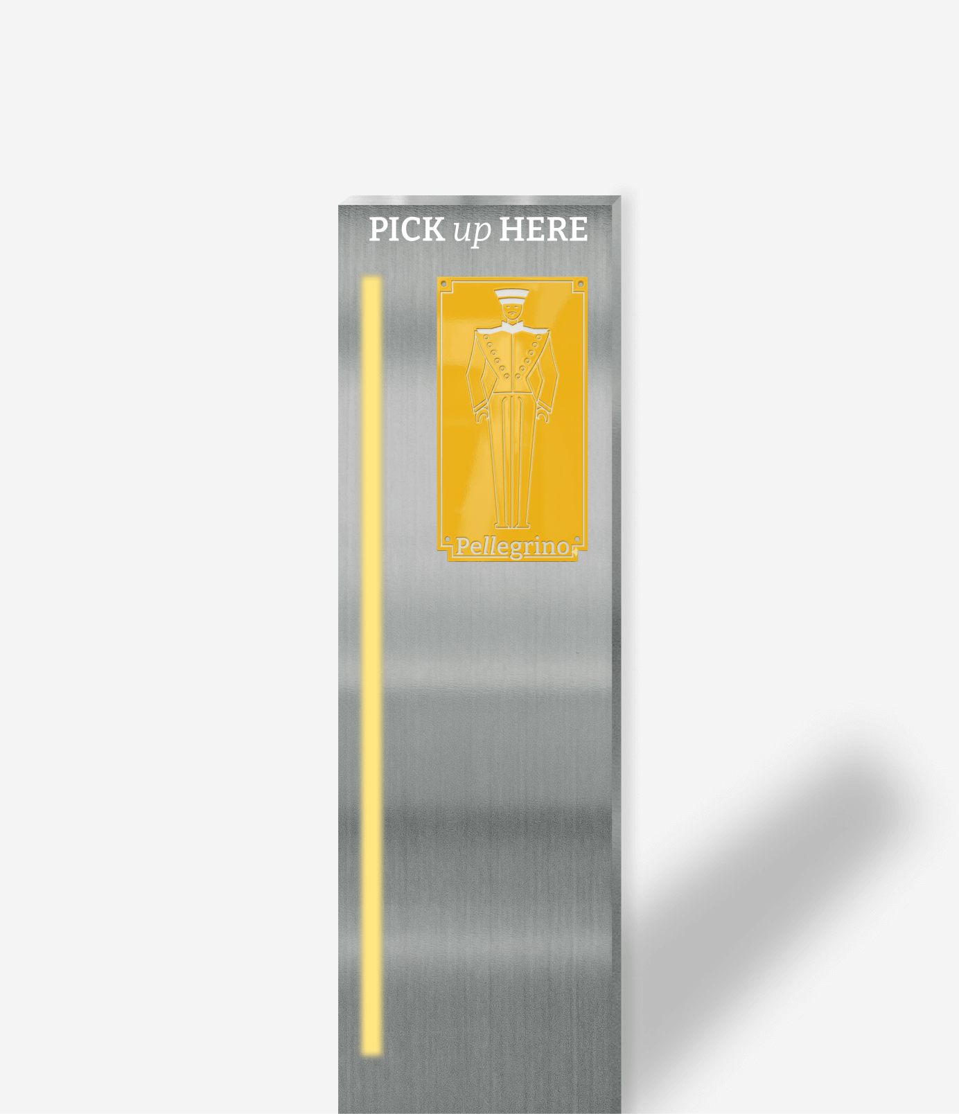 A silver-colored pick-up station with yellow accents and a printed figure of a man in a uniform with the text 'PICK UP HERE' at the top and 'Pellegrino' at the bottom.