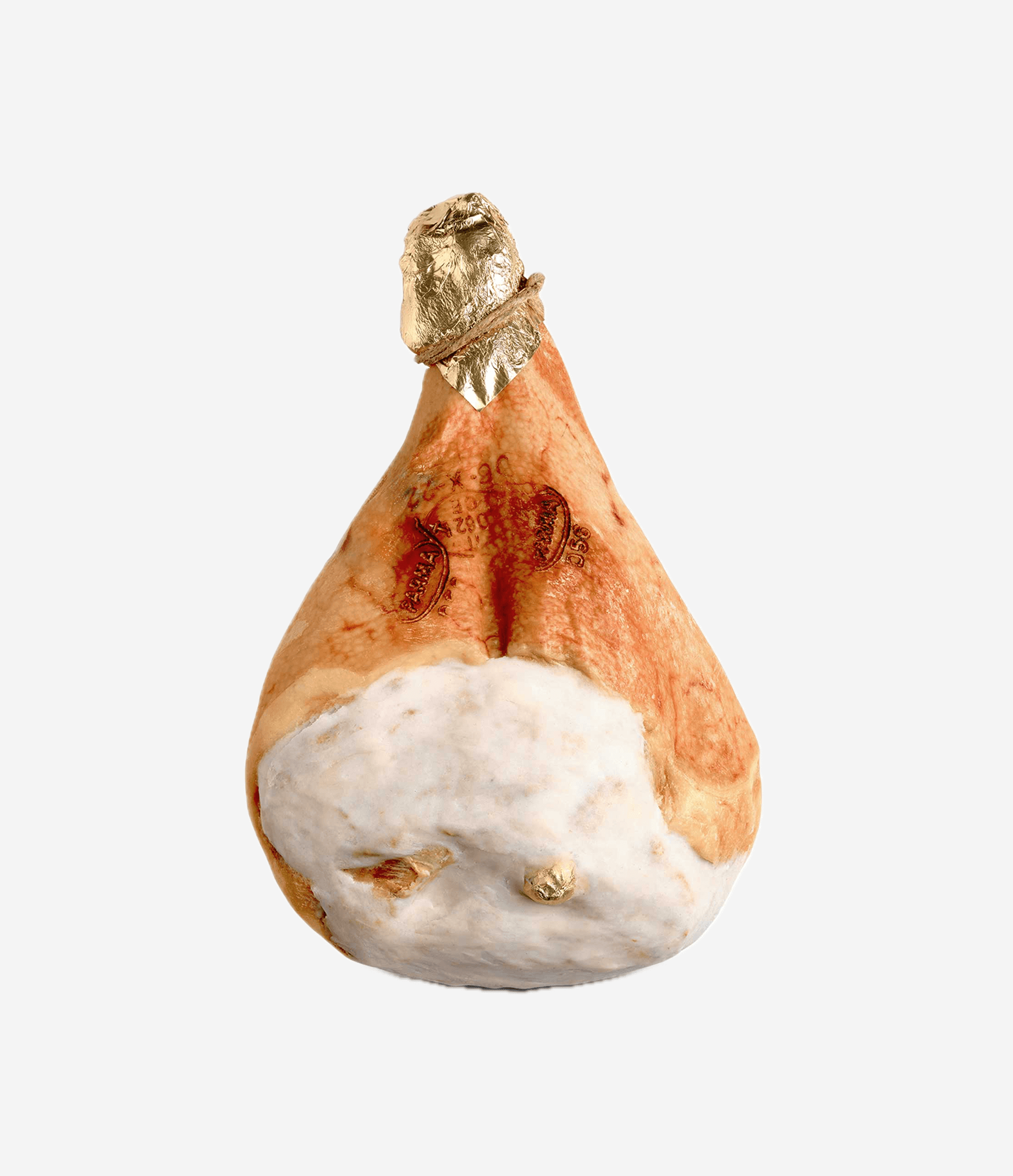 A pear with a gold foil top, decorated to resemble a person wearing a hat and a white beard, on a white background.