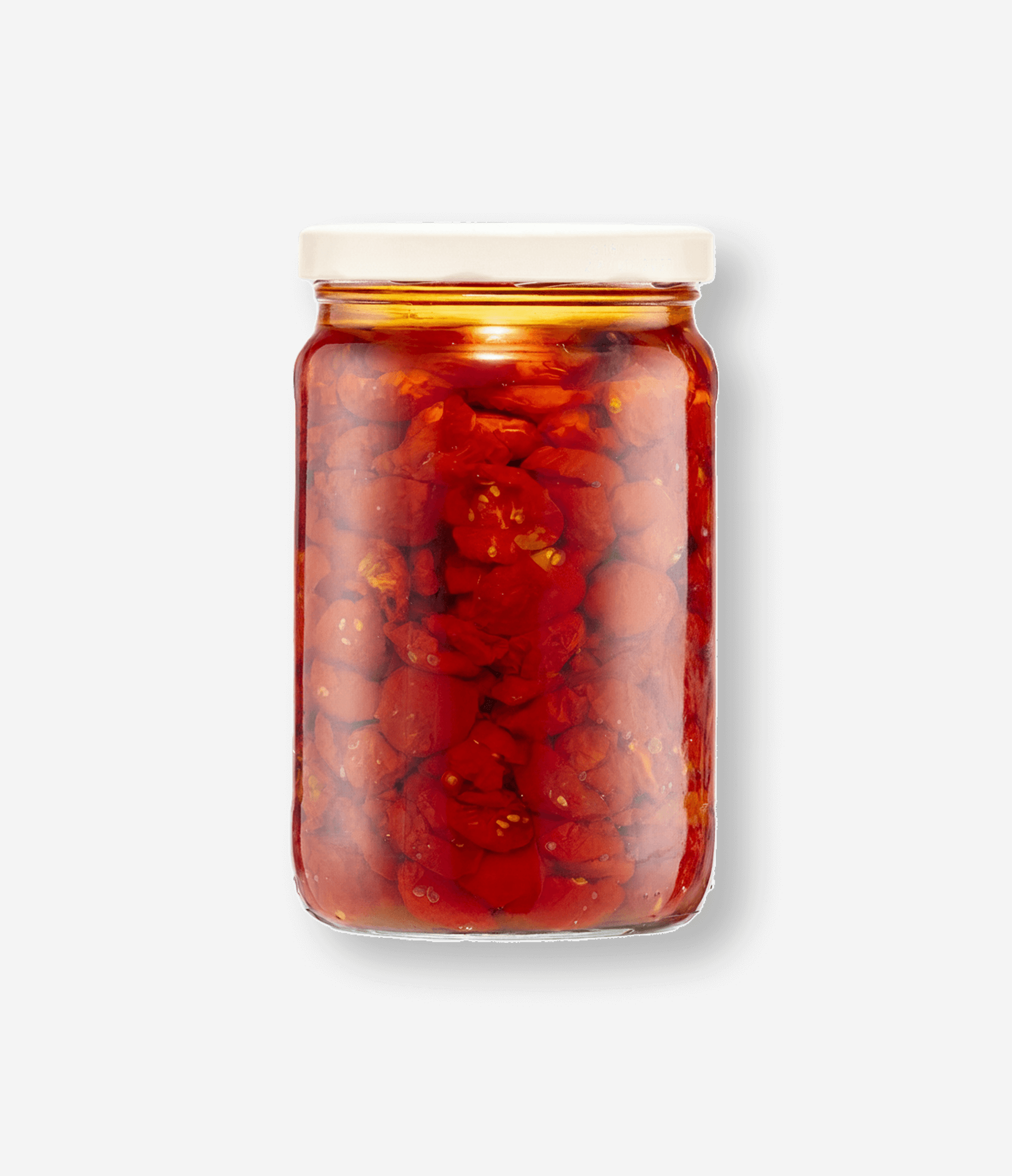Jar of preserved red chilies in liquid