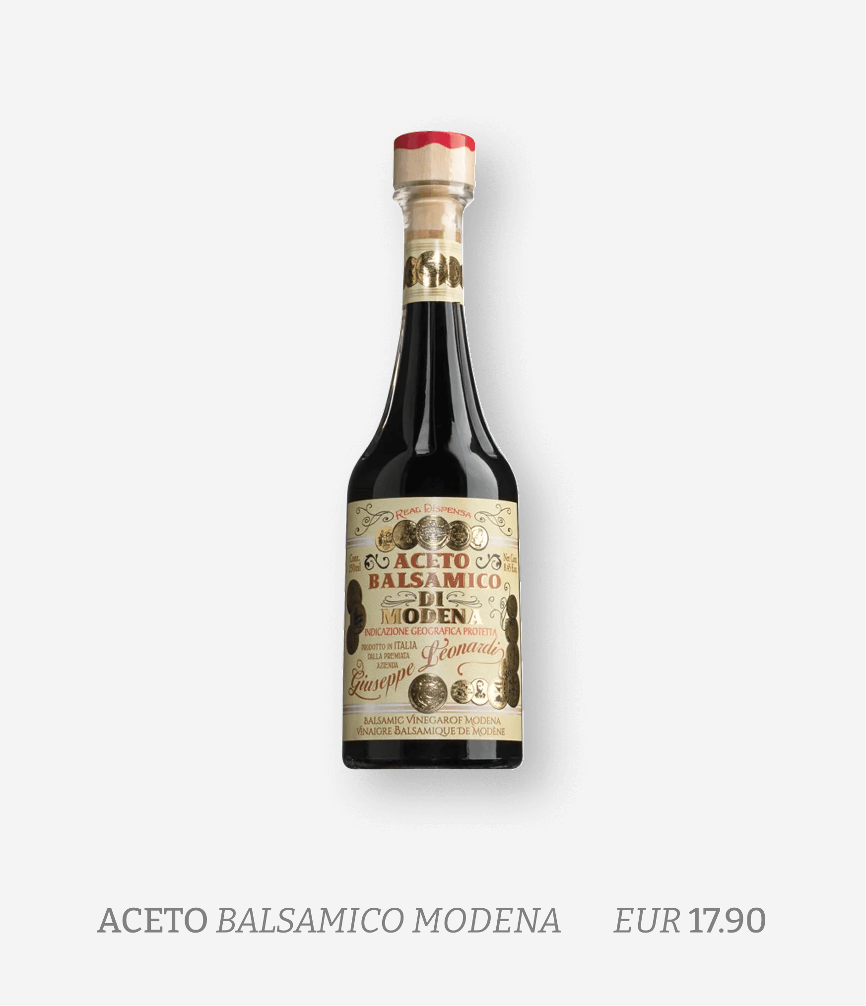 A bottle of balsamic vinegar with a traditional Italian label, priced at EUR 17.90.