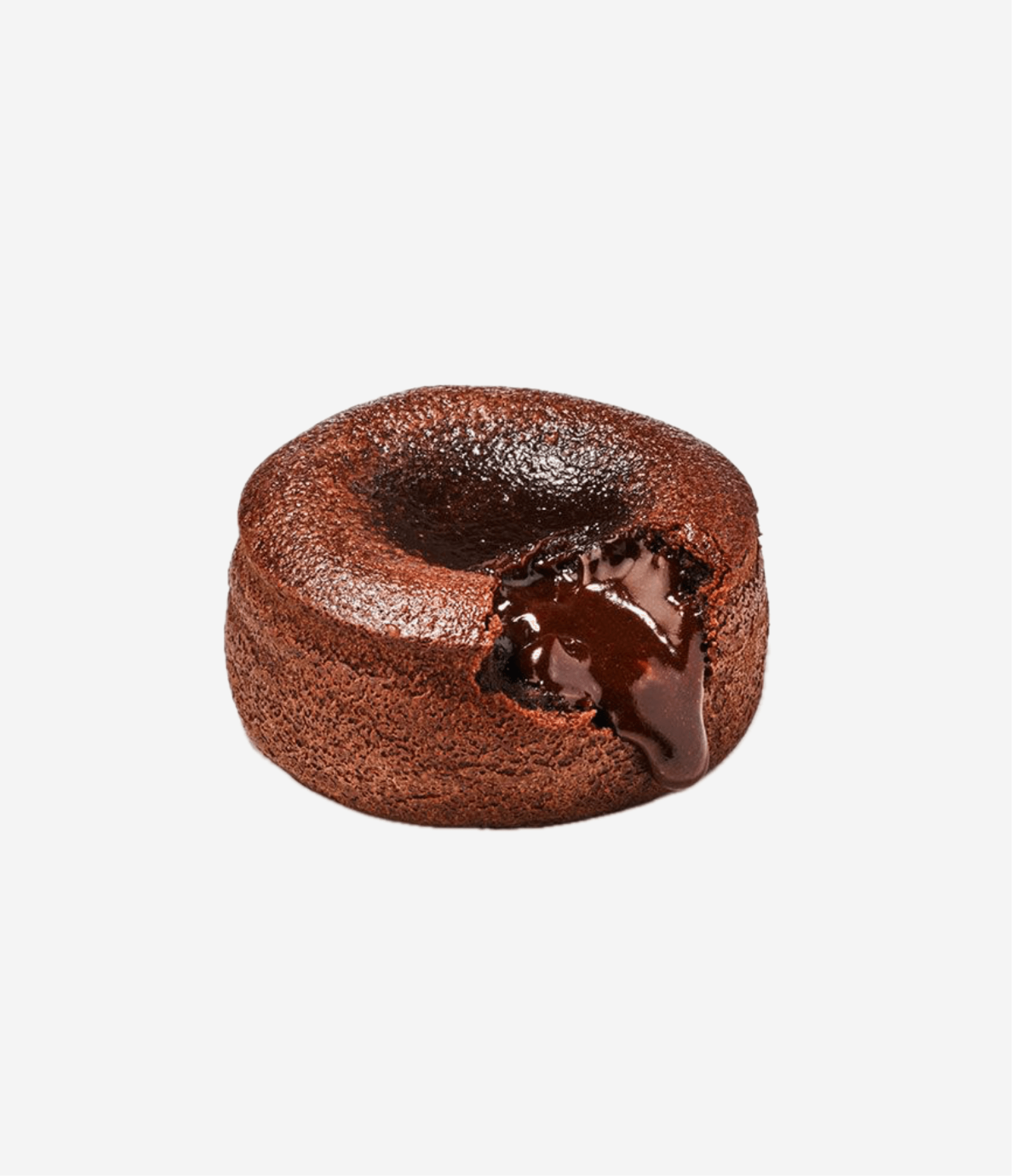 A chocolate lava cake with melted chocolate inside, on a plain white background.