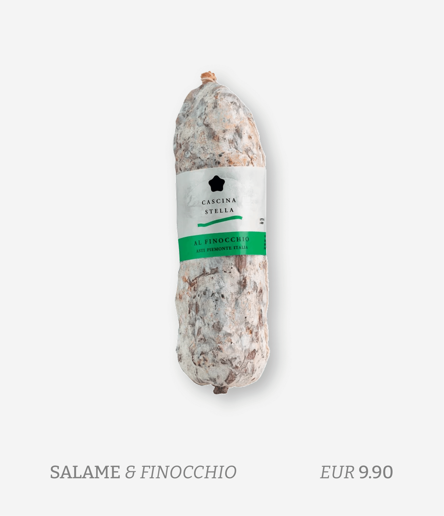 A piece of cured salami labeled 'Cascina Stella' with a white and green label, priced at EUR 9.90, on a plain white background.
