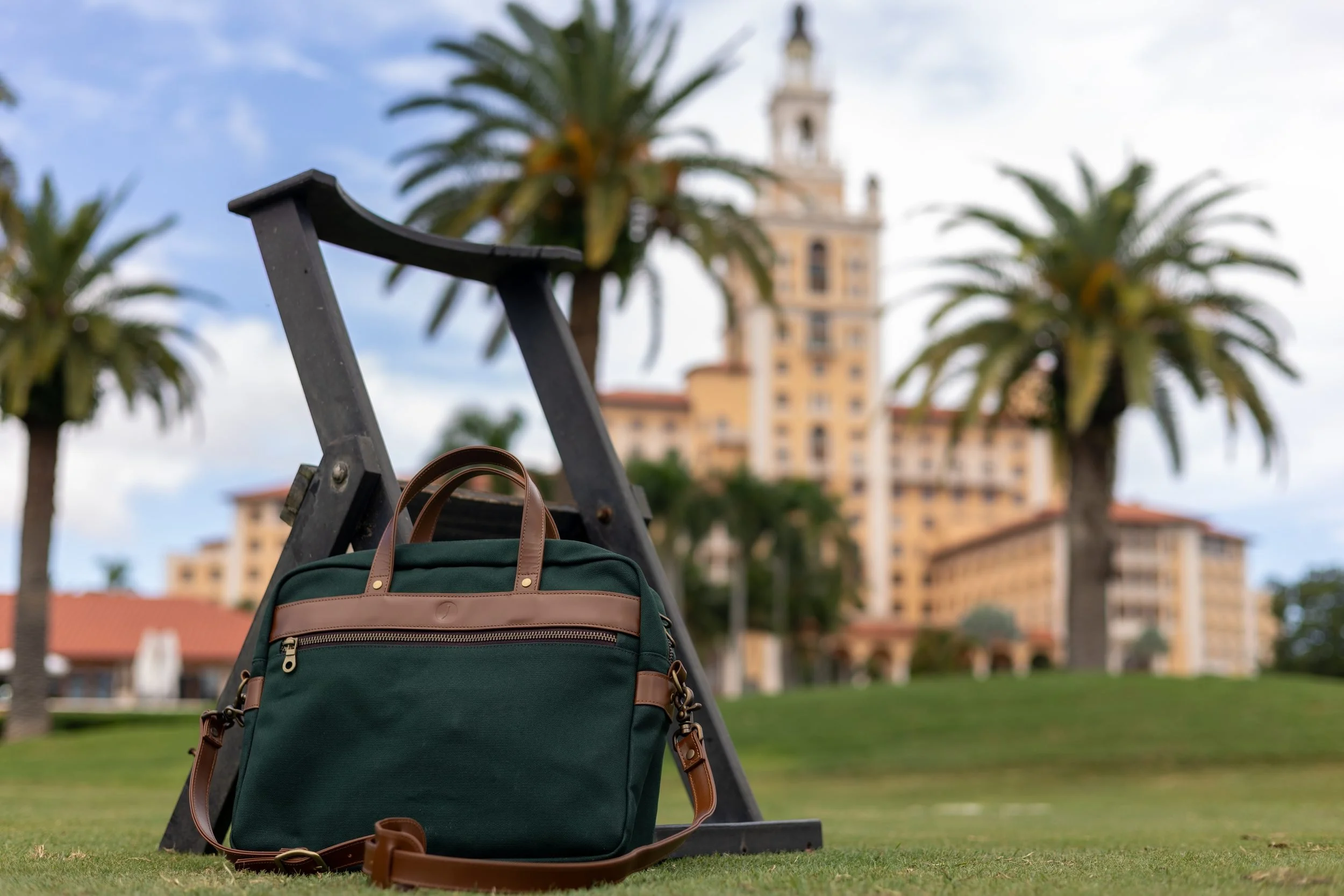 Wide shot of the Broken Tee Society bag at a bag stand on The Biltmore golf course