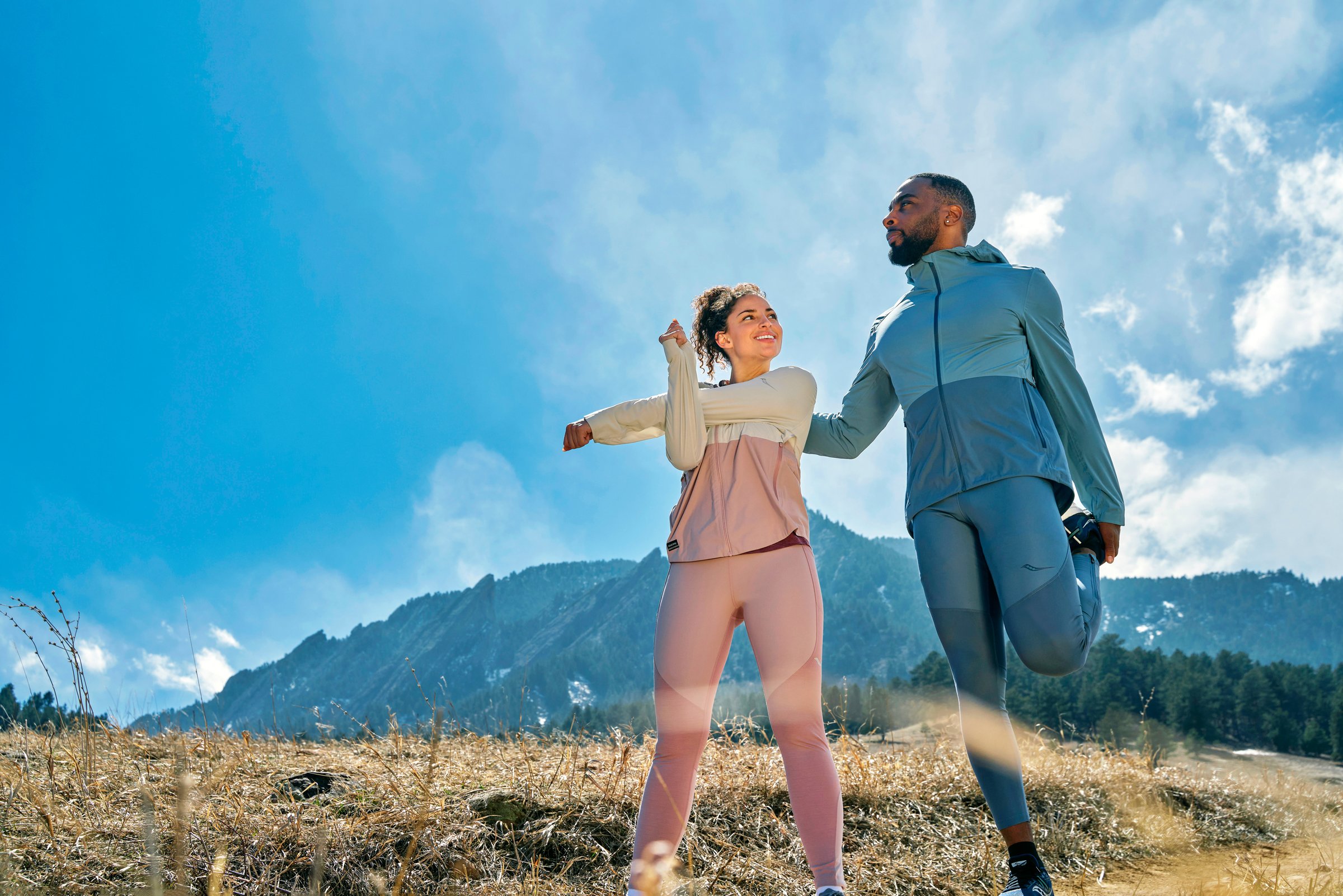 Couple Stretches at Chautauqua Park Saucony Running Apparel.
