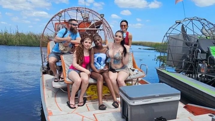 Guests aboard a private Everglades airboat tour near Miami
