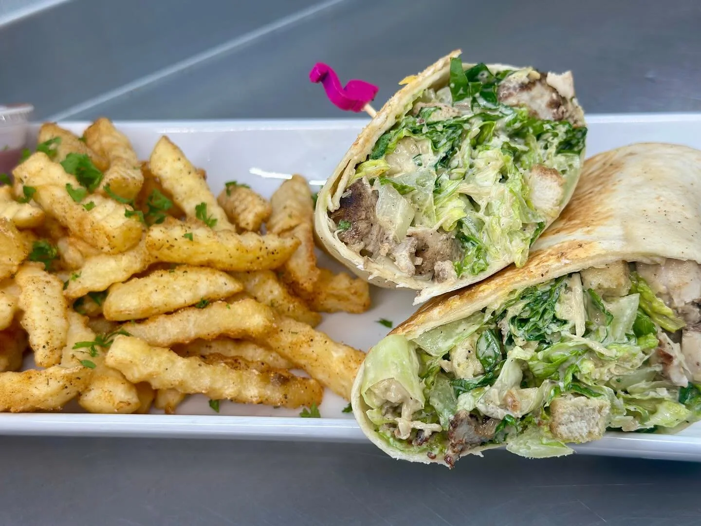 🚨TODAYS SPECIAL‼️

Jerk Chicken Caesar Wrap with choice of side $18 
.
.
.
#islandtingzbarandgrill 🏝️ #specials 
#morethanjustafoodtruck