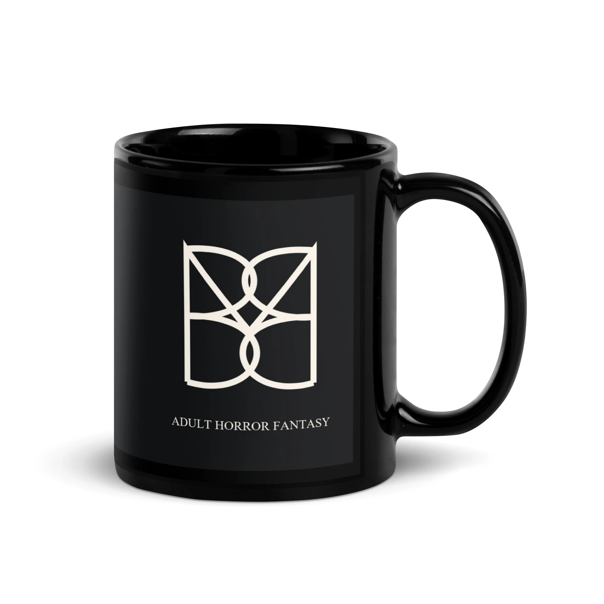 Beauty Has Teeth black mug with the pointed BMB logo