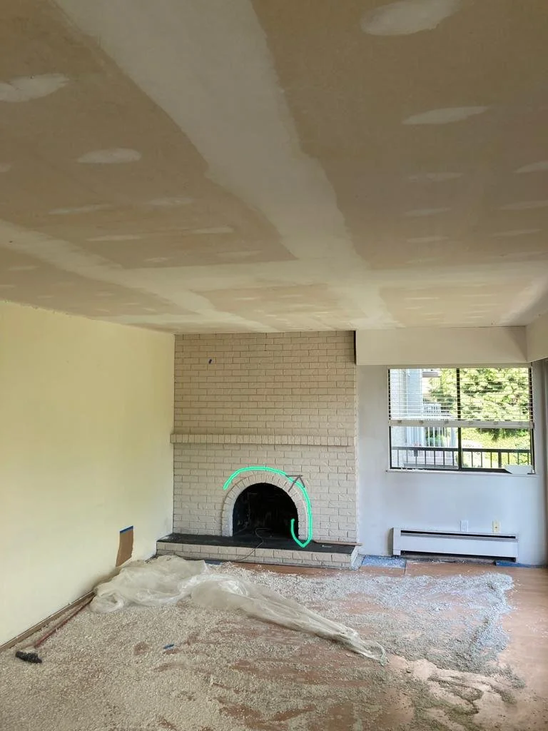 Before: Outdated brick fireplace with heavy texture