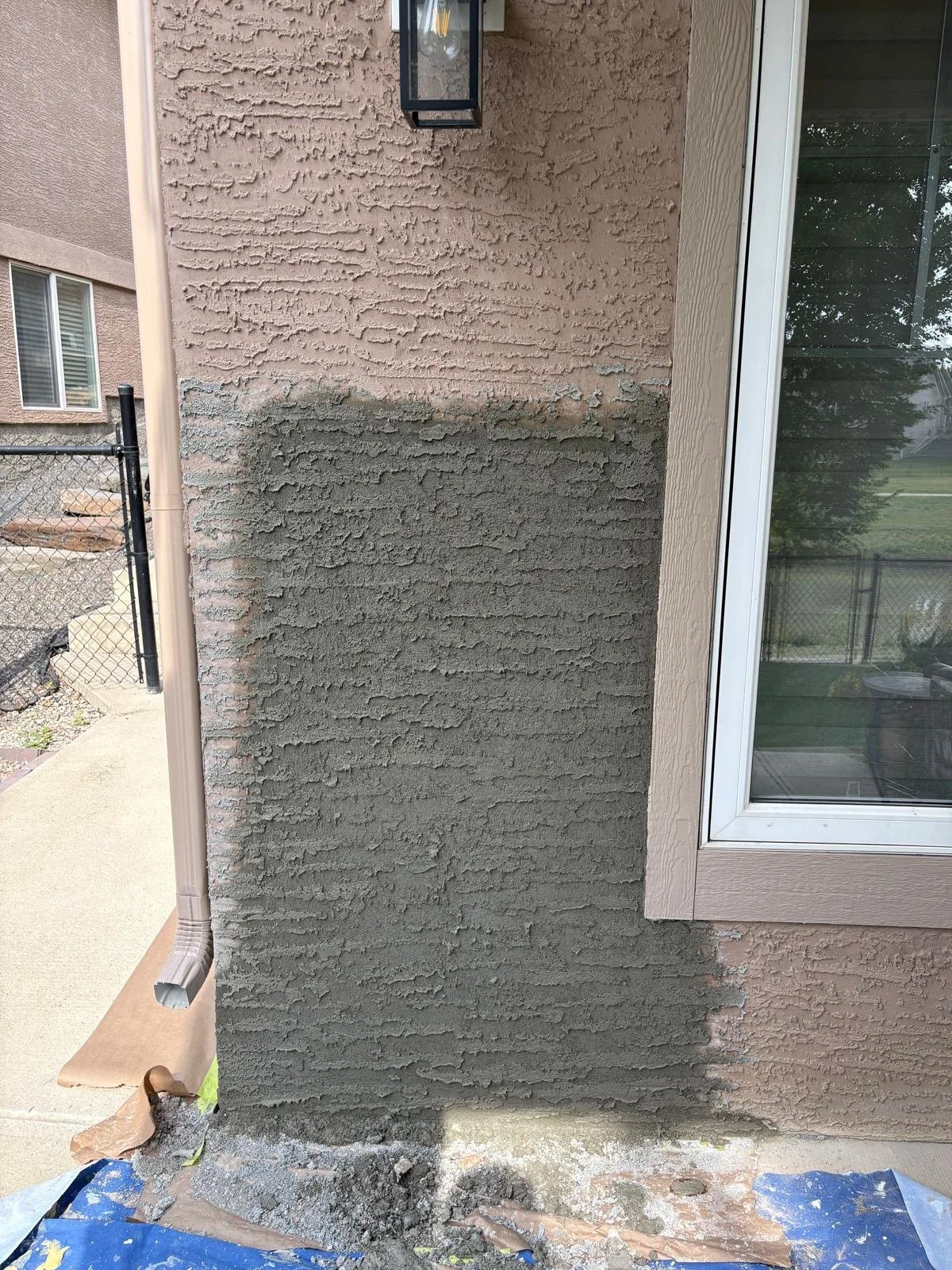 We turned this from old cracked stucco into a seamless perfection.