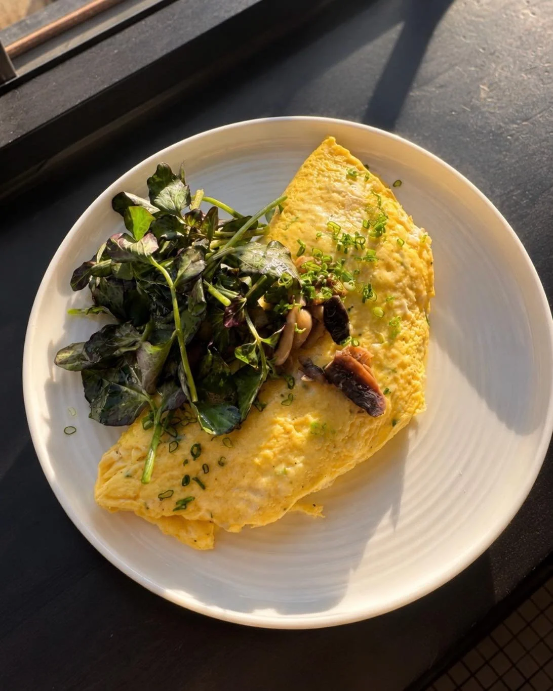 Tomorrow is the last Sunday of the month, and you know what that means, brunch at Tallgrass!

Come try our "Not a French Omelet" featuring farm eggs, roasted local mushrooms, cr&egrave;me fra&icirc;che, and chives, served with a bright wate