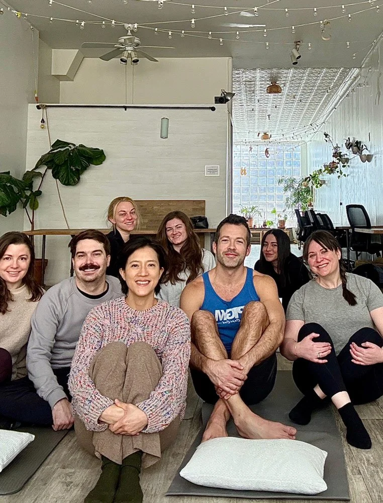 Small group seated together for a private birthday sound bath at Bat Haus in Brooklyn, creating an intimate and calming celebration led by Soundawn at Bat Haus.