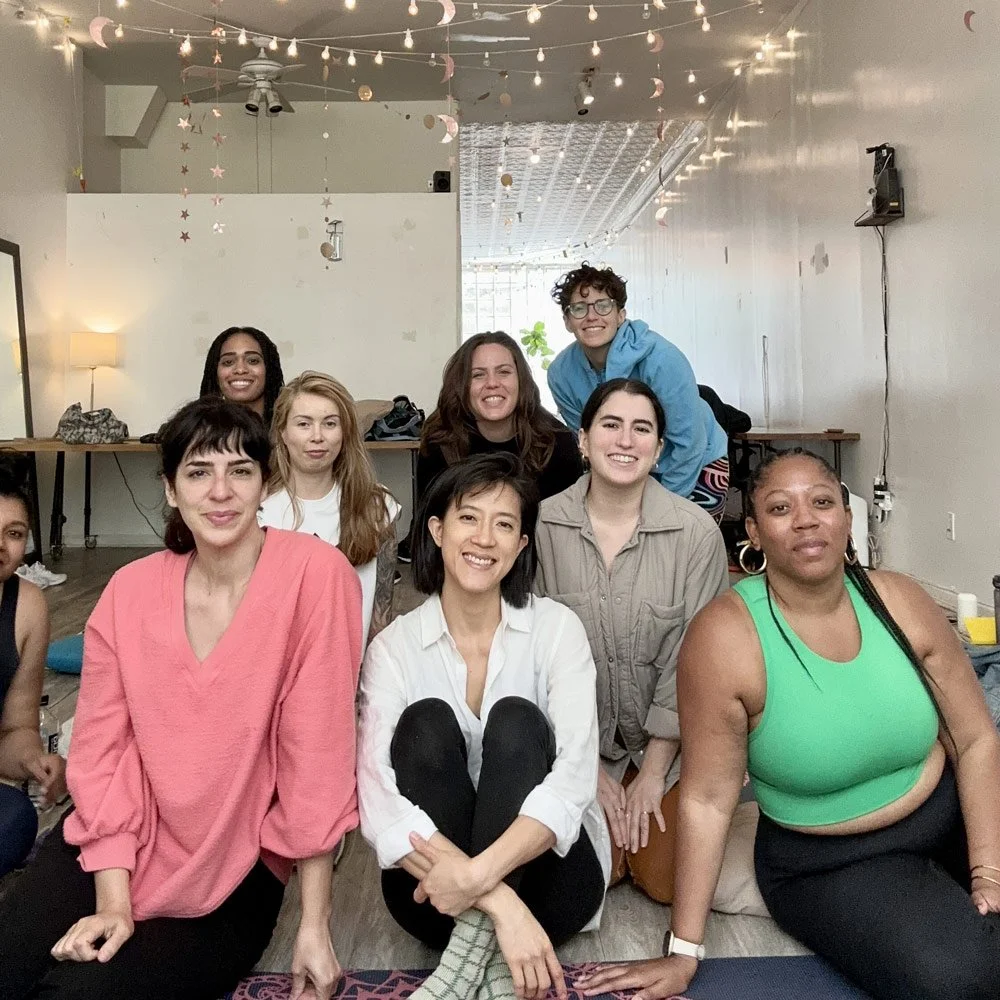 A group gathered on floor cushions after a guided sound bath at Bat Haus in Williamsburg, Brooklyn, led by wellness partner Soundawn