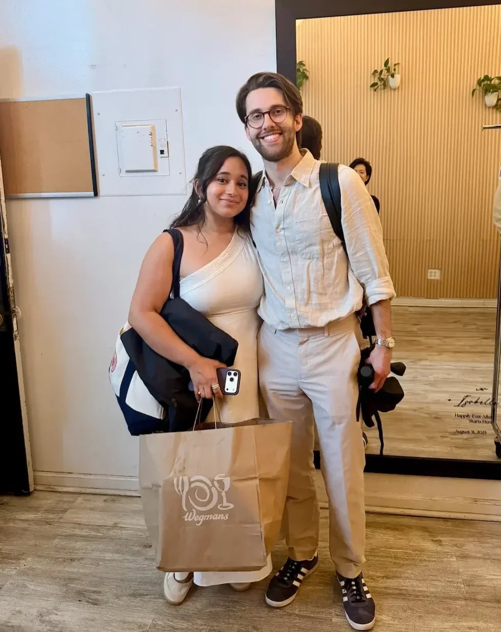 A newly engaged couple at their engagement party at Bat Haus in Williamsburg, Brooklyn.