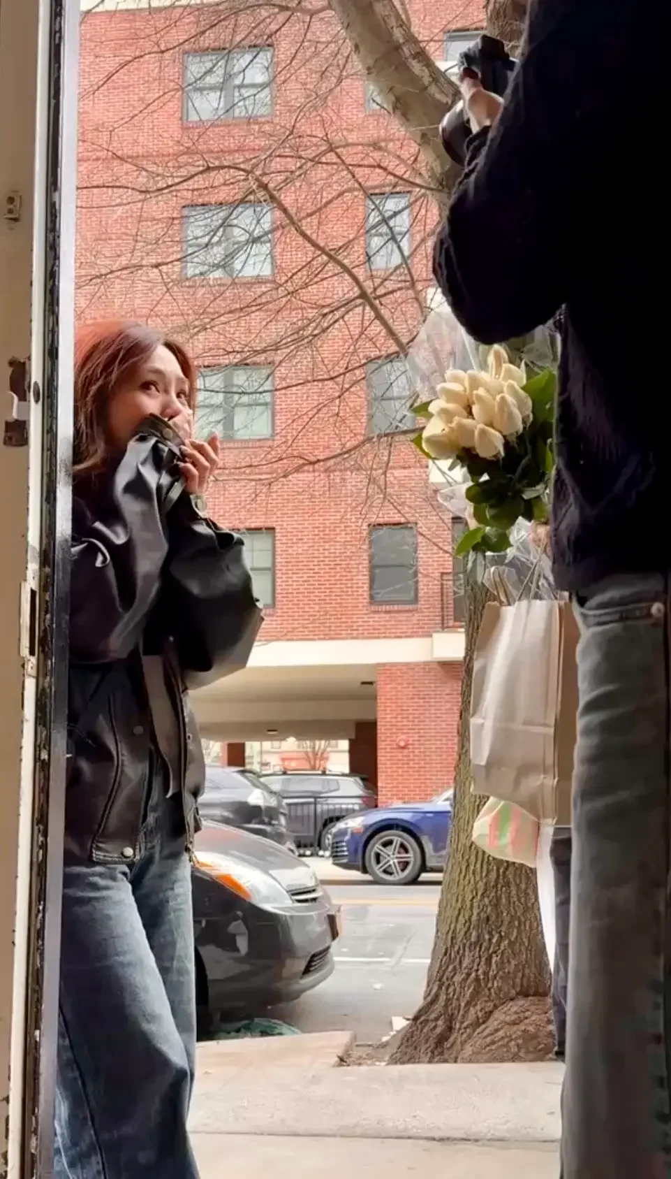 An emotional partner discovering her surprise proposal as she arrives at Bat Haus, a discreet surprise proposal venue in Williamsburg, Brooklyn.