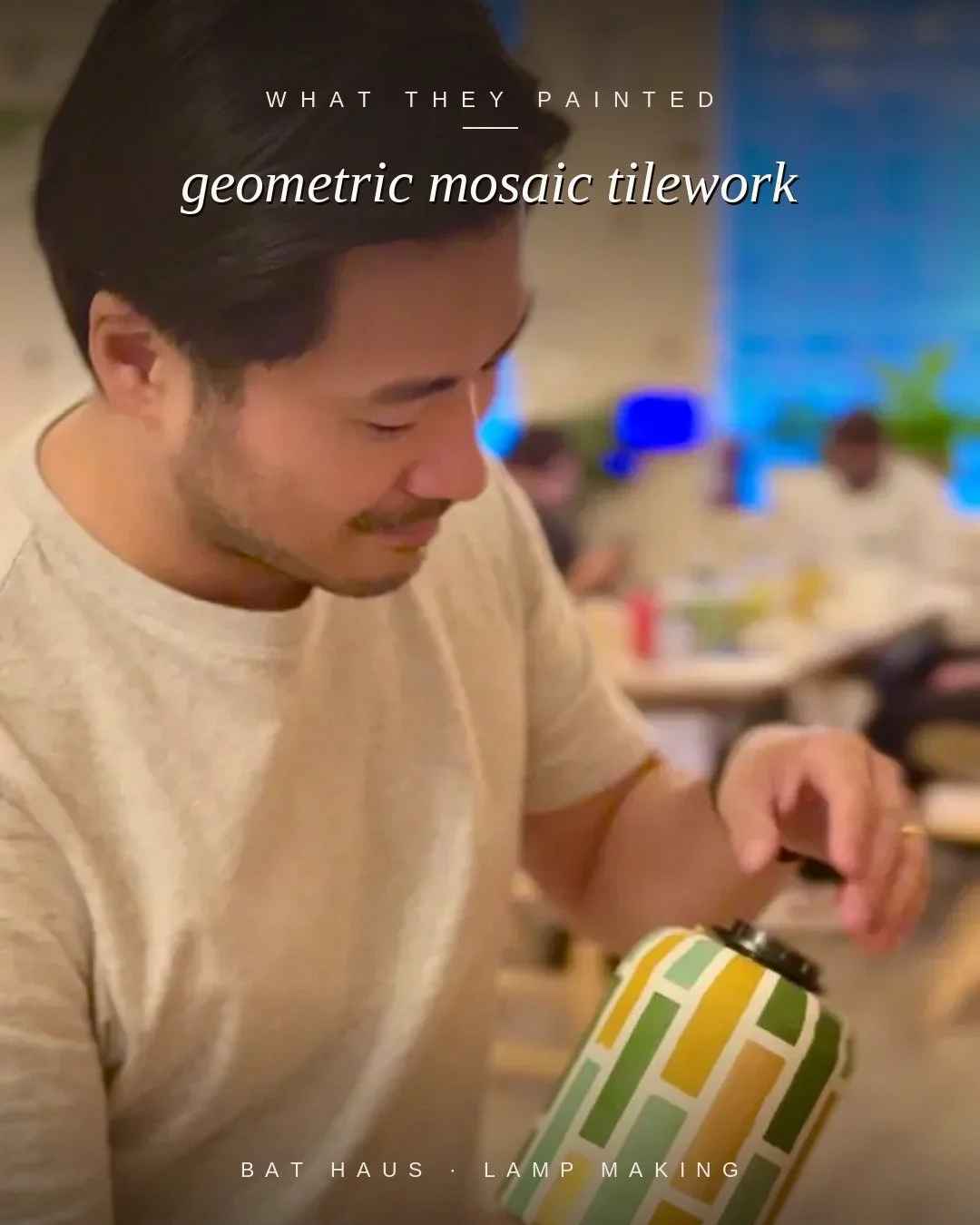 uest with a lamp painted in a green and gold geometric mosaic tile pattern.