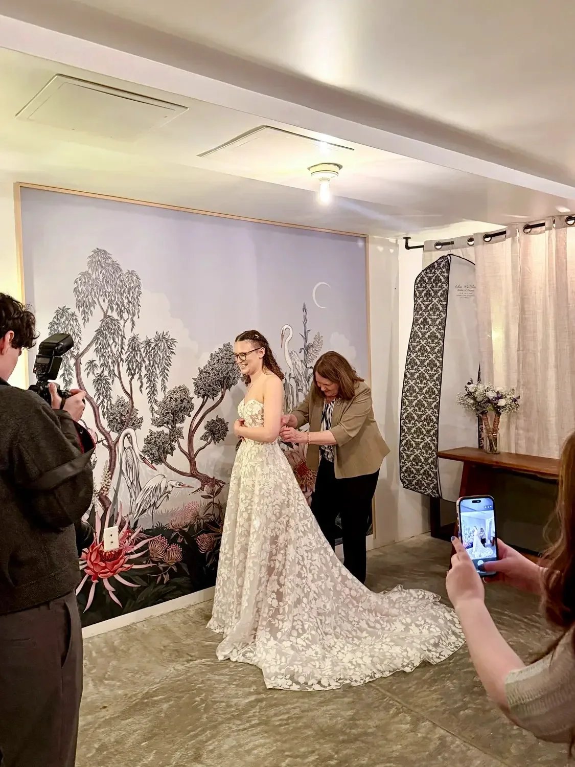 Bridal changing space at Bat Haus Brooklyn downstairs with mural backdrop, mirror, and private area for wedding preparation