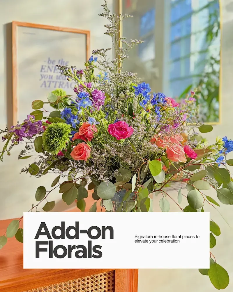 Add-on floral arrangement designed in-house at Bat Haus Brooklyn event space with colorful seasonal flowers.