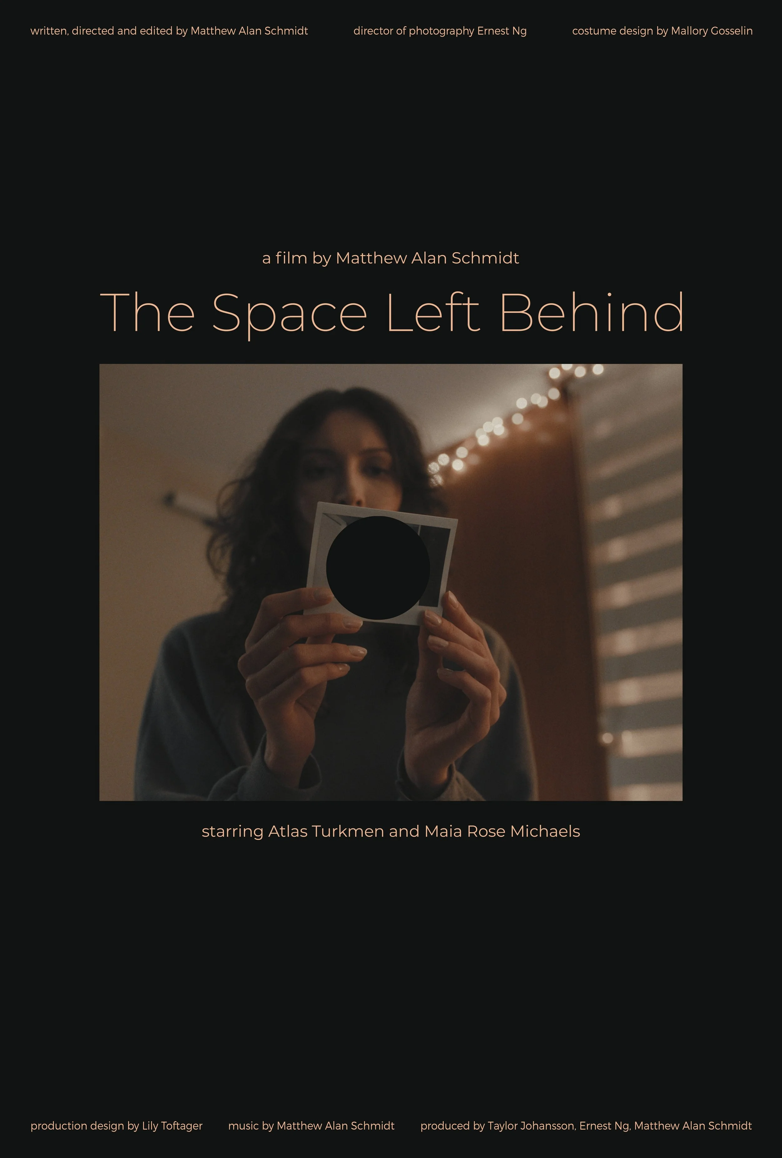 Poster for the film 'The Space Left Behind' featuring a woman holding a polaroid photograph in a warmly lit room with string lights, with the film's credits and credits at the top and bottom.