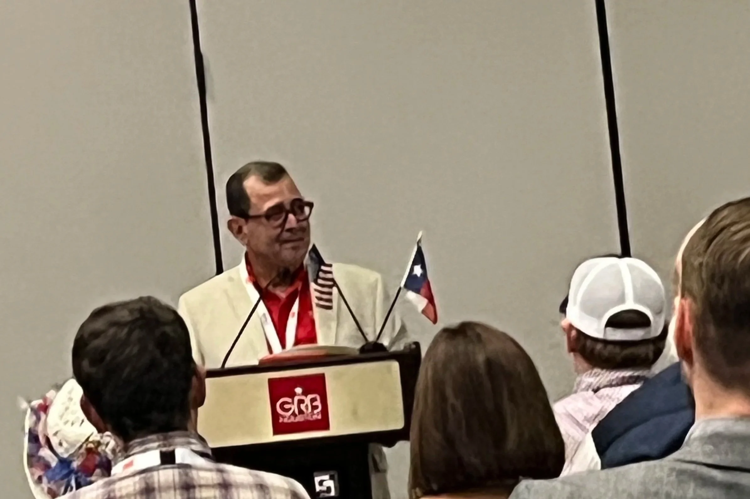 Senator Pete Flores welcomes the SD 24 Delegates.  Thanks, Senator, for the early morning coffee!