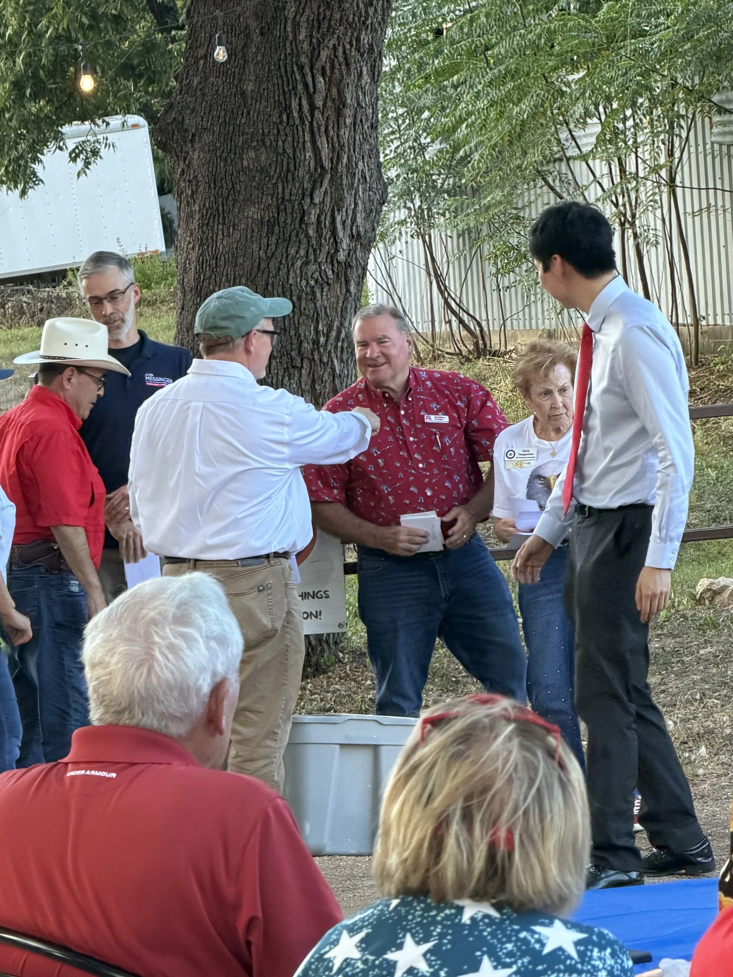 Russell Tutor & Gail Teegarden, representing Burnet County Republican Club & Burnet County Republican Women Club, presented donations to several candidates who were in attendance.  Pictured are candidates Sen. Pete Flores, John Messinger, Kevin Yeary