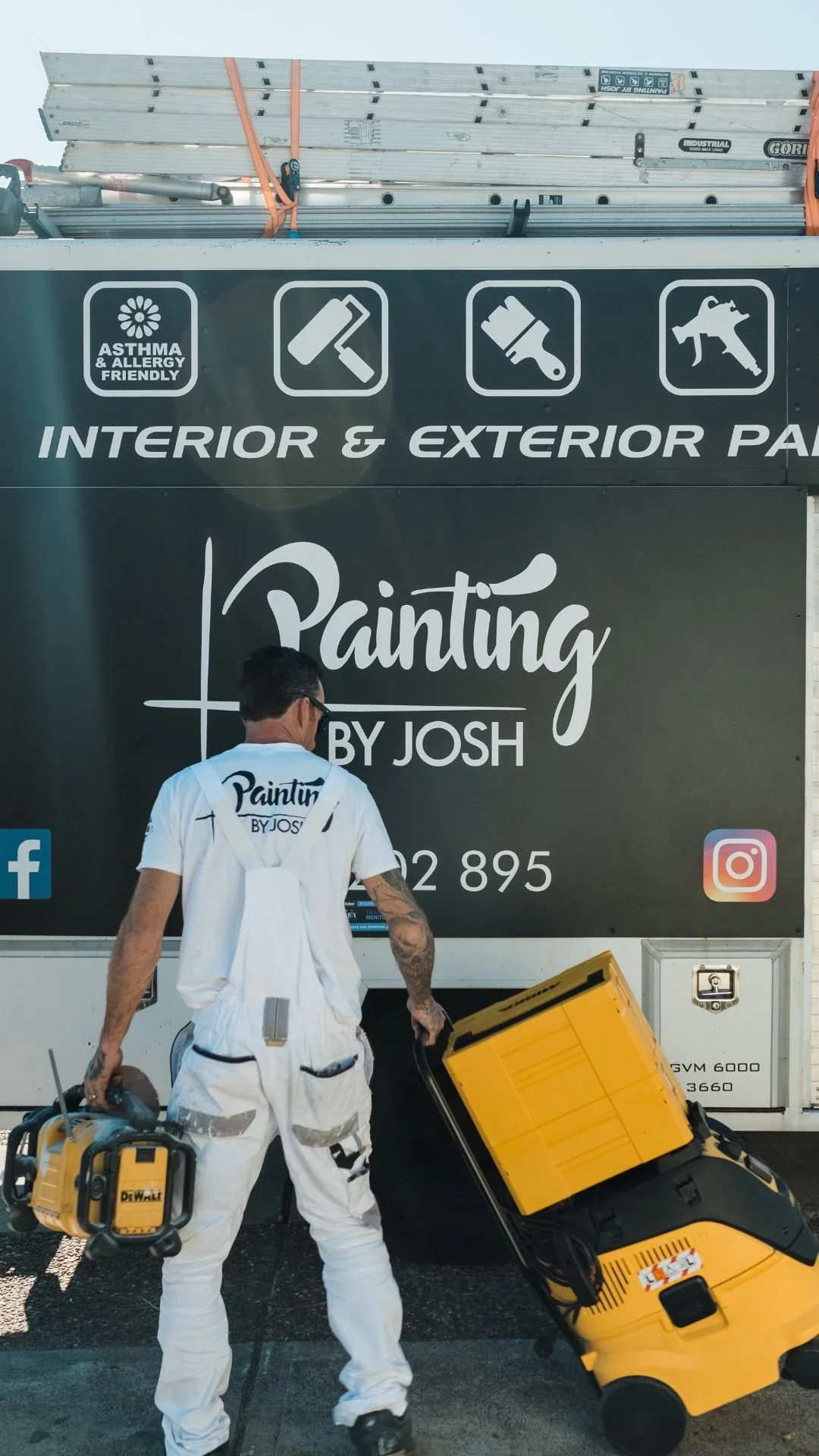 Painter loading equipment into van labeled 'Painting by Josh', with ladders and painting tools, emphasizing interior and exterior services.