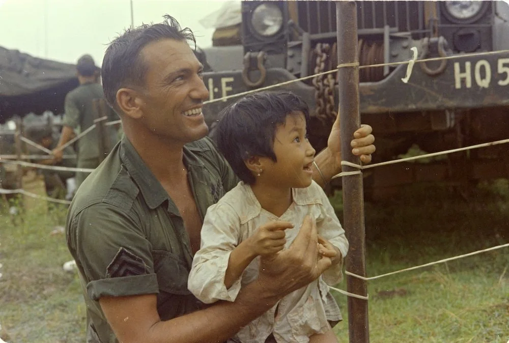 1st Infantry Division holding Vietnamese child 1967
