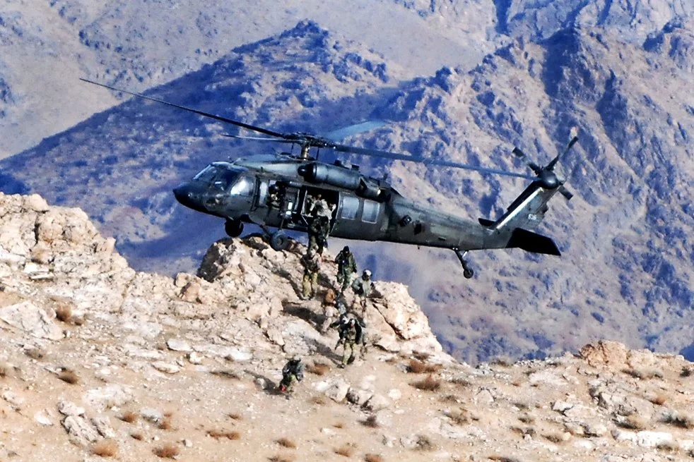 U.S. Army Special Forces exit a UH-60 Black Hawk