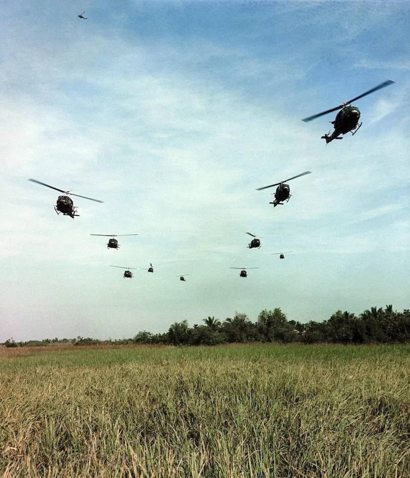 UH-1 helicopters preparing to disembark Infantry soldiers